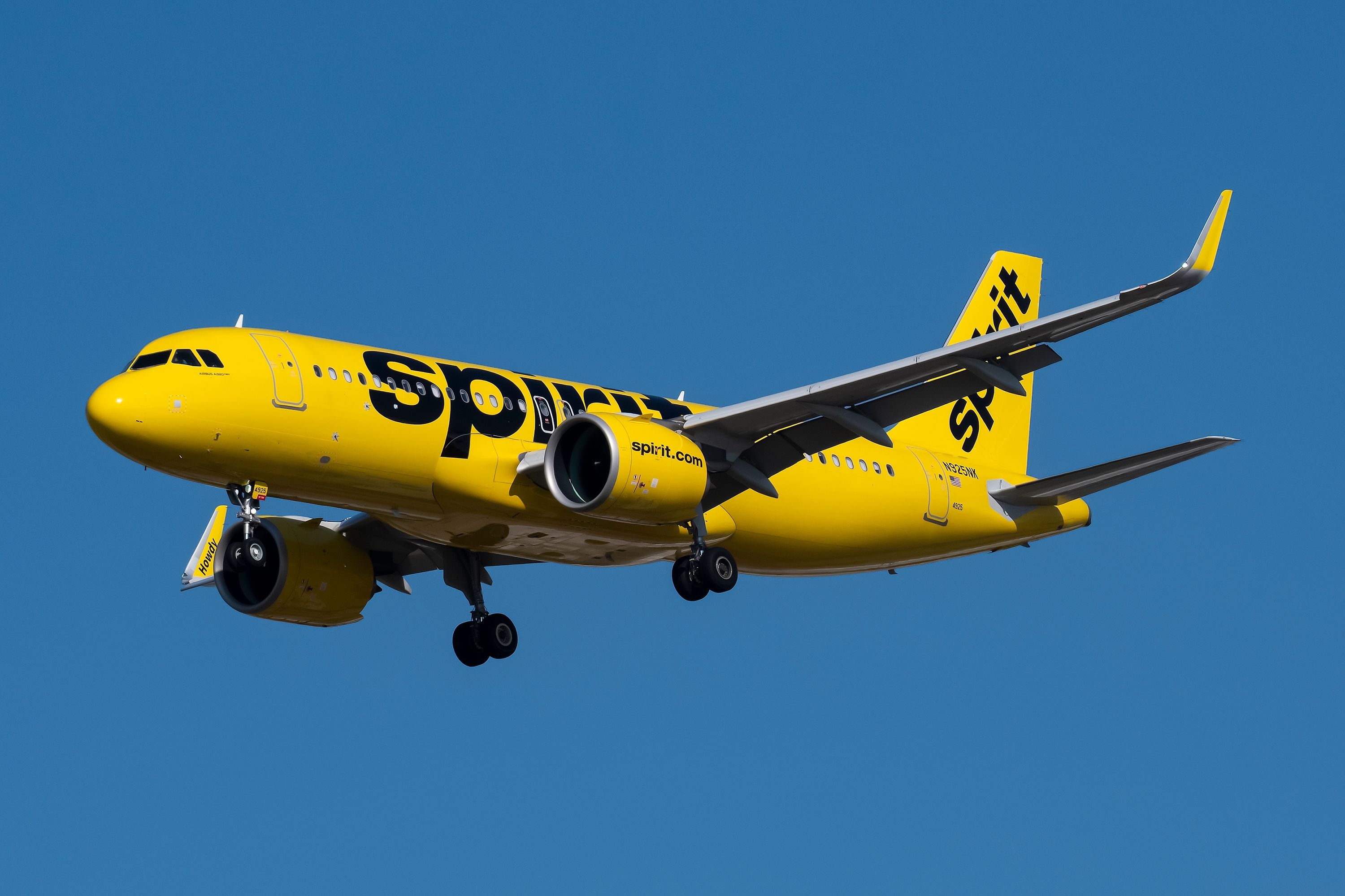 Spirit Airlines Airbus A320neo landing at DFW shutterstock_2256371149