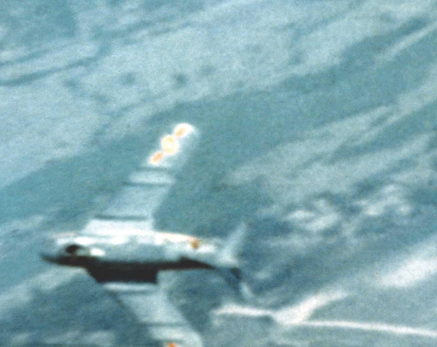 Gun camera photo shows a North Vietnamese MiG-17-fighter.