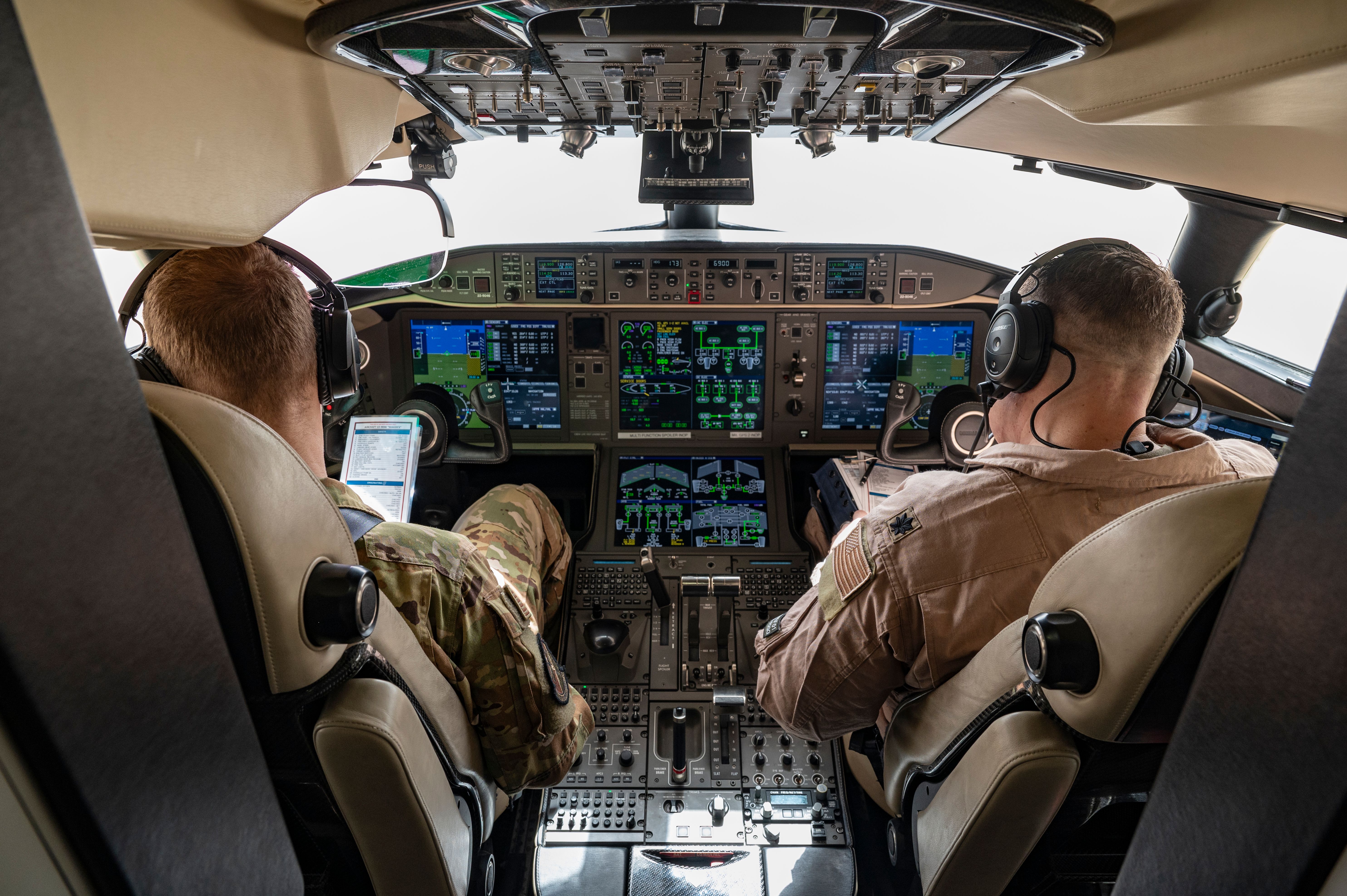 Photo of E-11A BACN pilots during preflight procedures