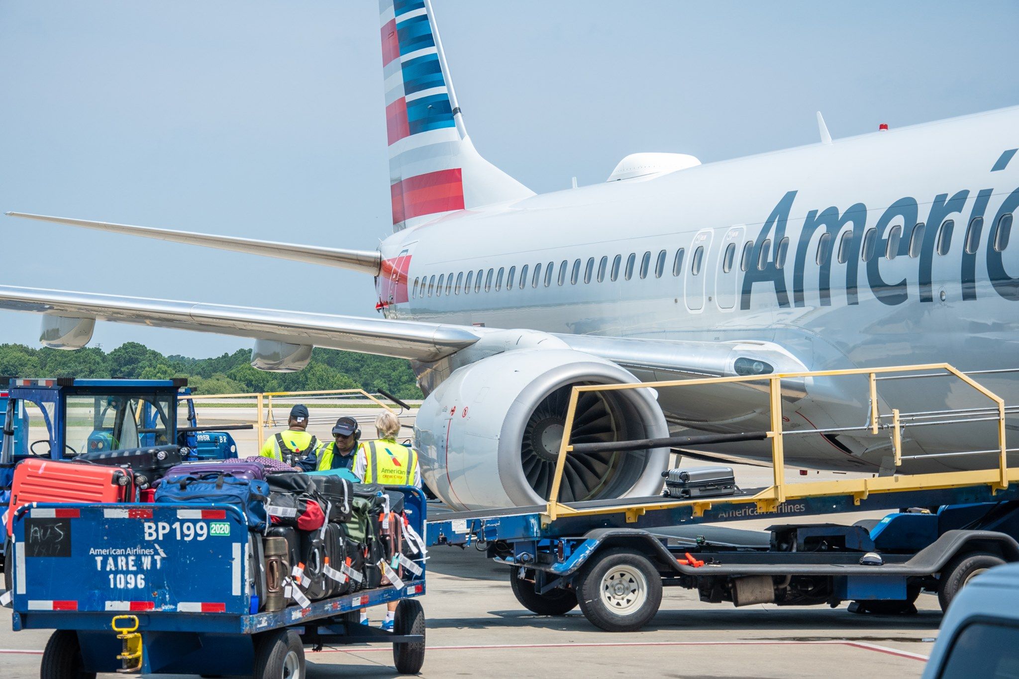 Baggage being loaded in American Airlines Boeing 737-800 at Raleigh-Durham International Airport.