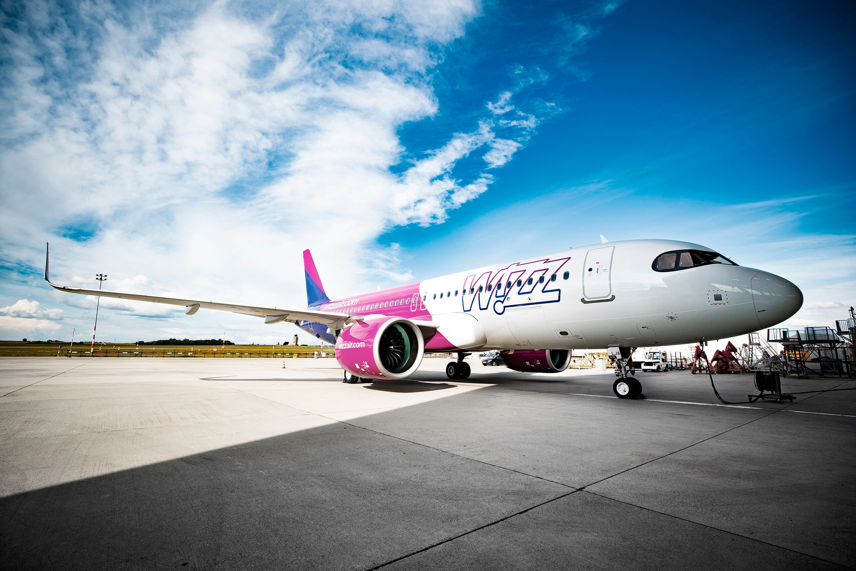 Wizz Air Airbus A320neo Parked Under Blue Skies