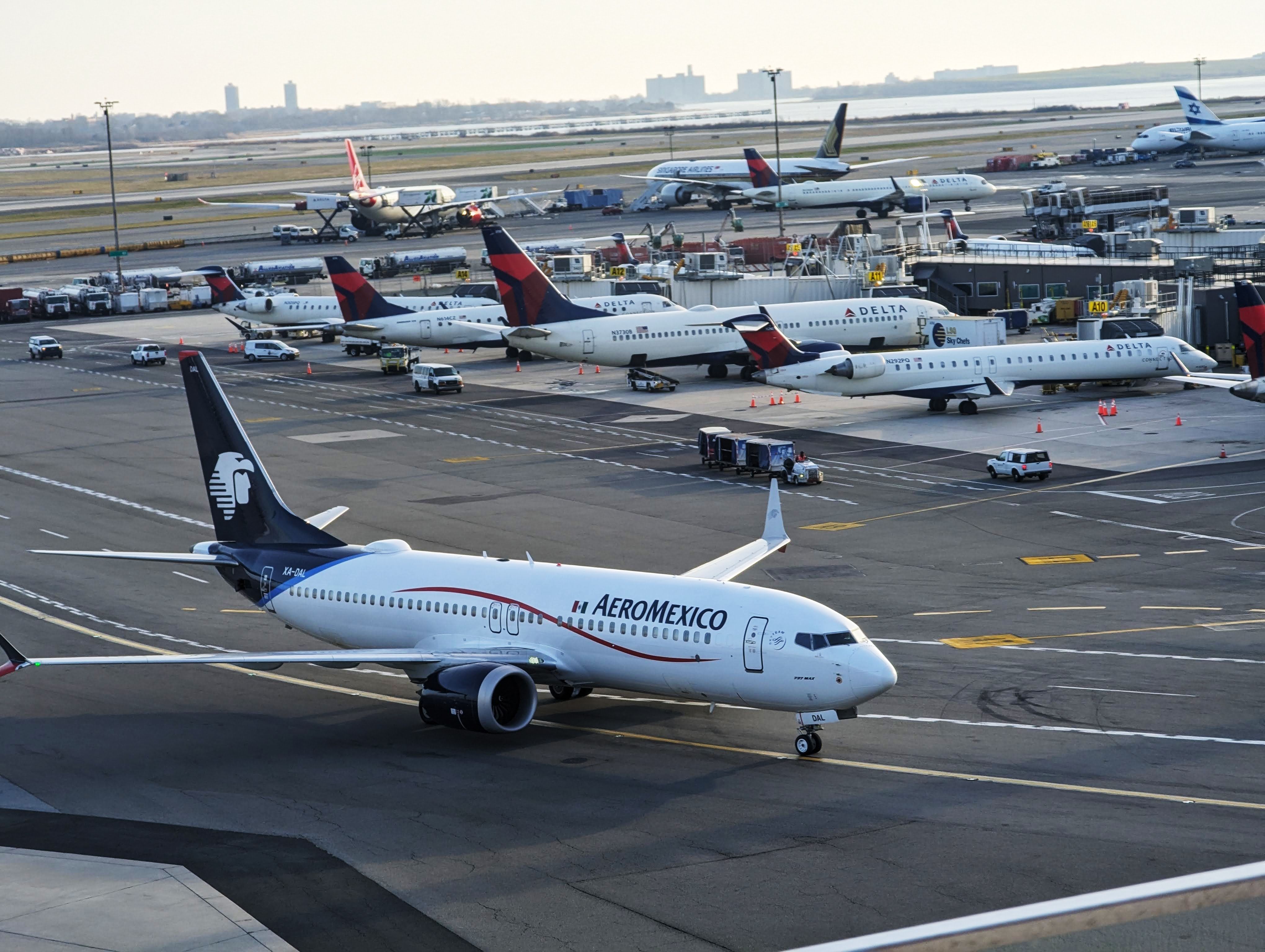 Aeromexico and Delta Air Lines aircraft at JFK shutterstock_2413677107