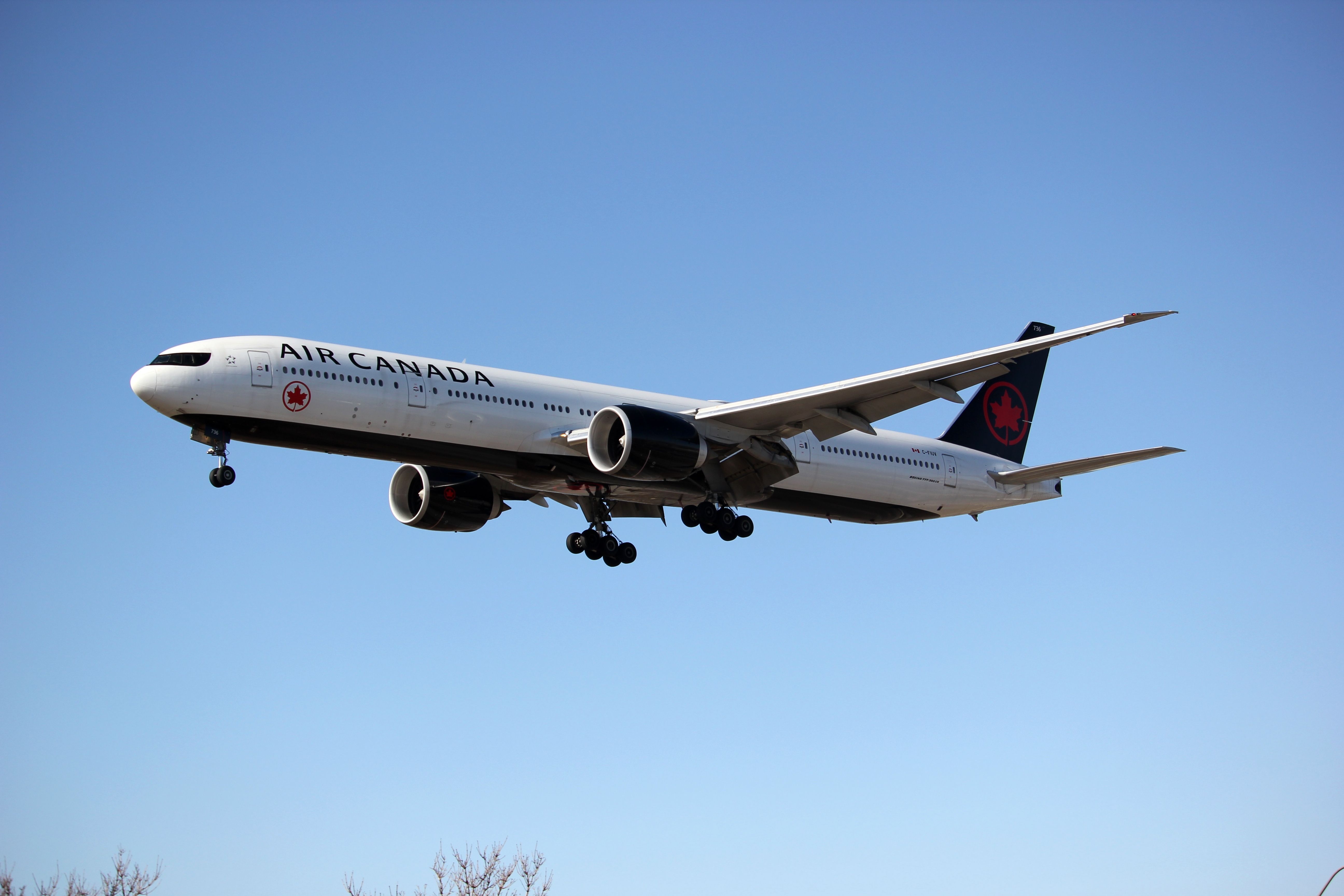 Air Canada Boeing 777 landing at YYZ shutterstock_2299666725