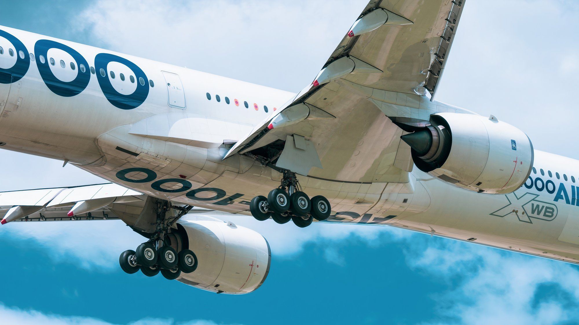 Airbus-A350-with-its-main-landing-gear-extended-at-Toulouse-Airport-TLS