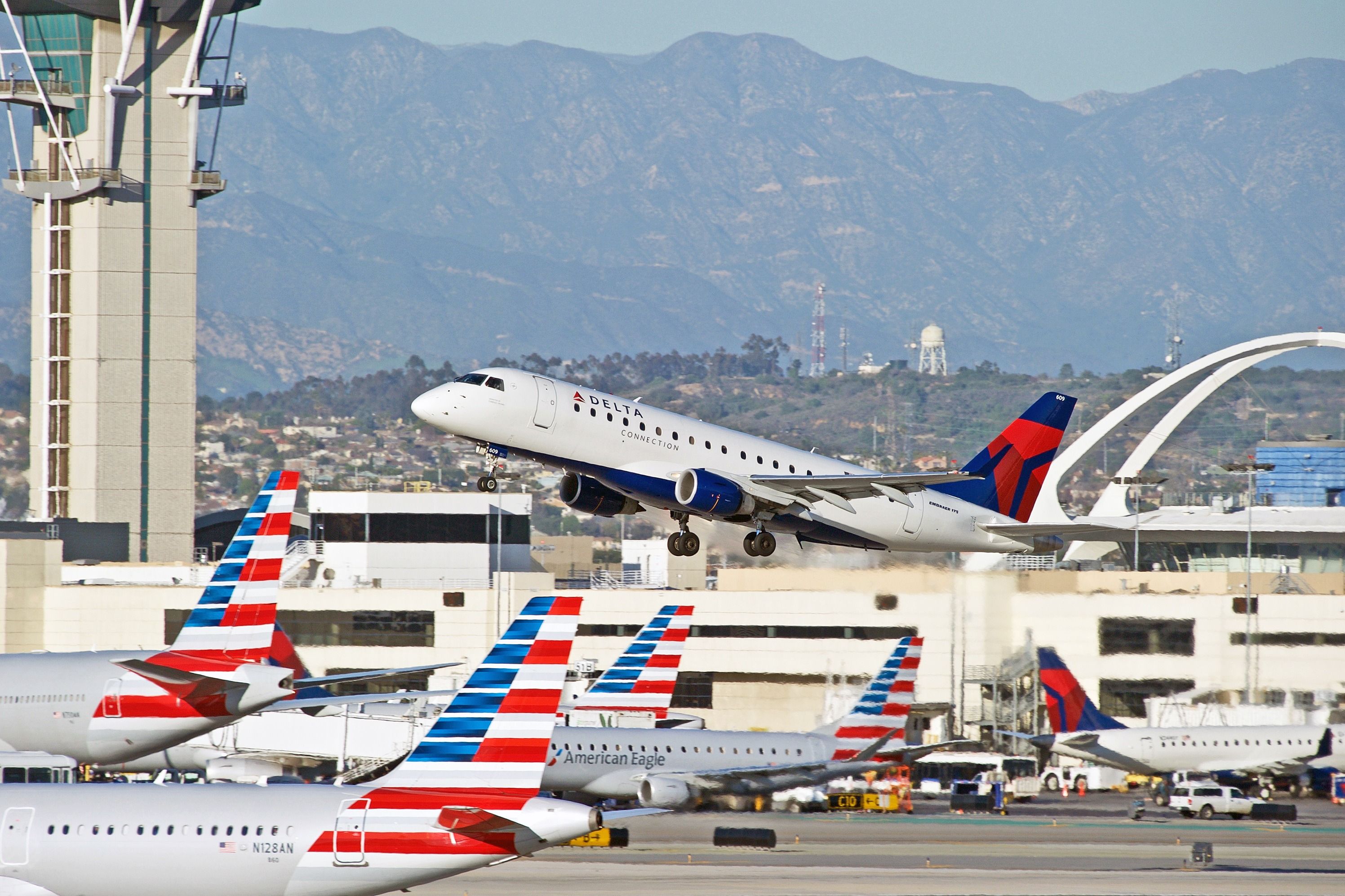 American Airlines and Delta Air Lines aircraft at LAX shutterstock_589877828