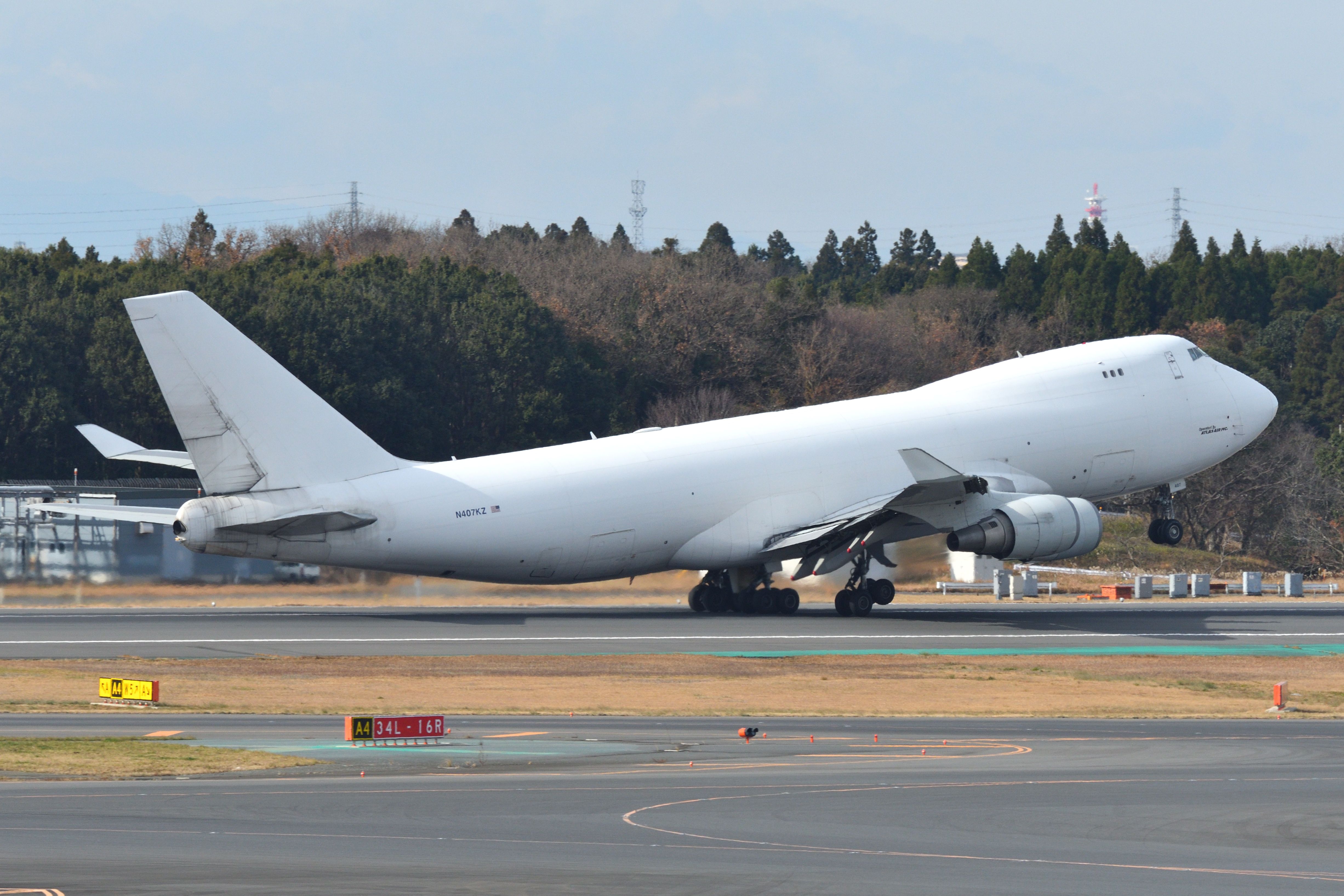 Atlas Air Boeing 747-400F departing Japan shutterstock_1886249710