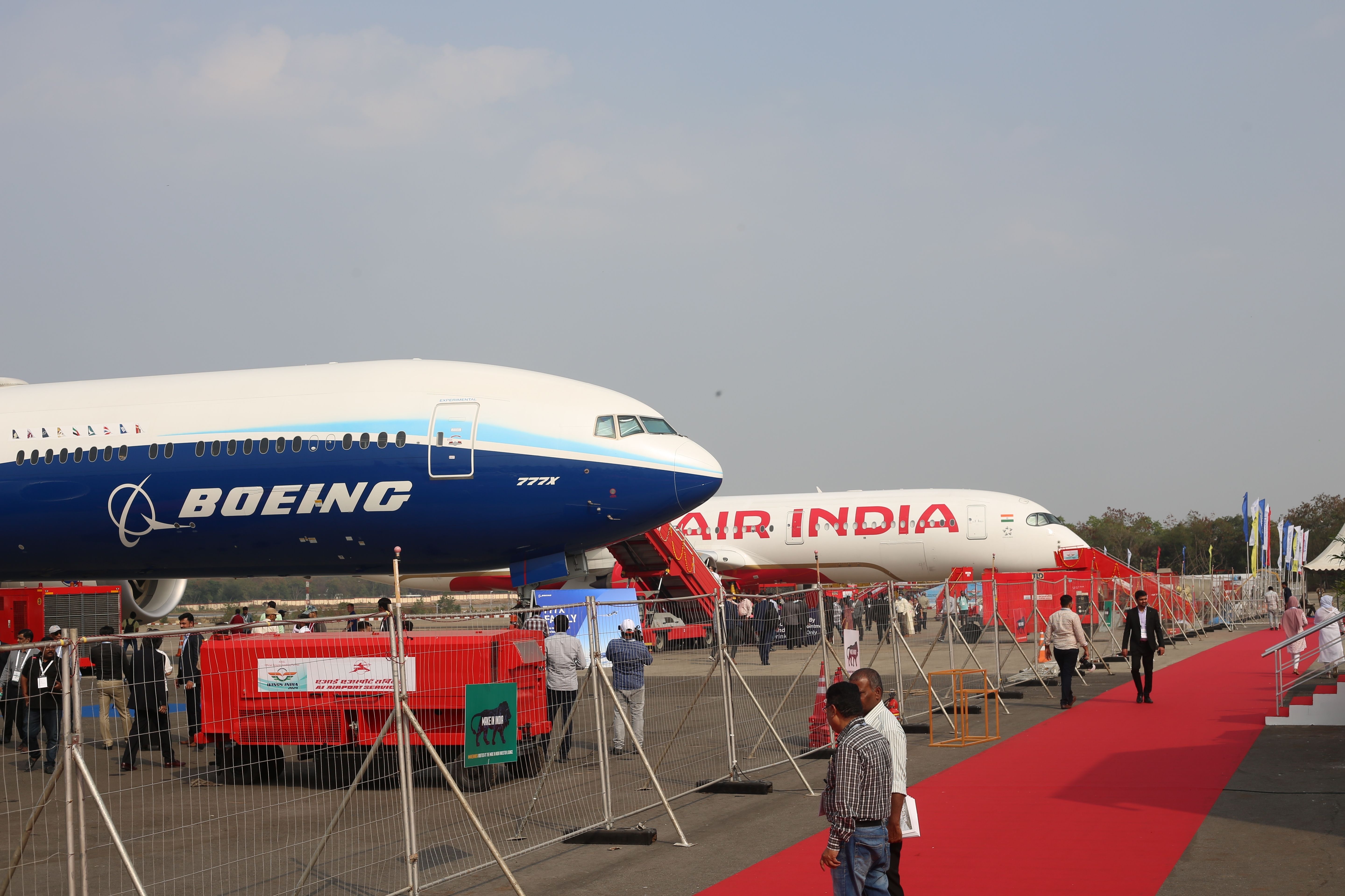 Boeing 777X with an Air India Airbus A350-900 in the background at Wings India 2024 shutterstock_2416278881