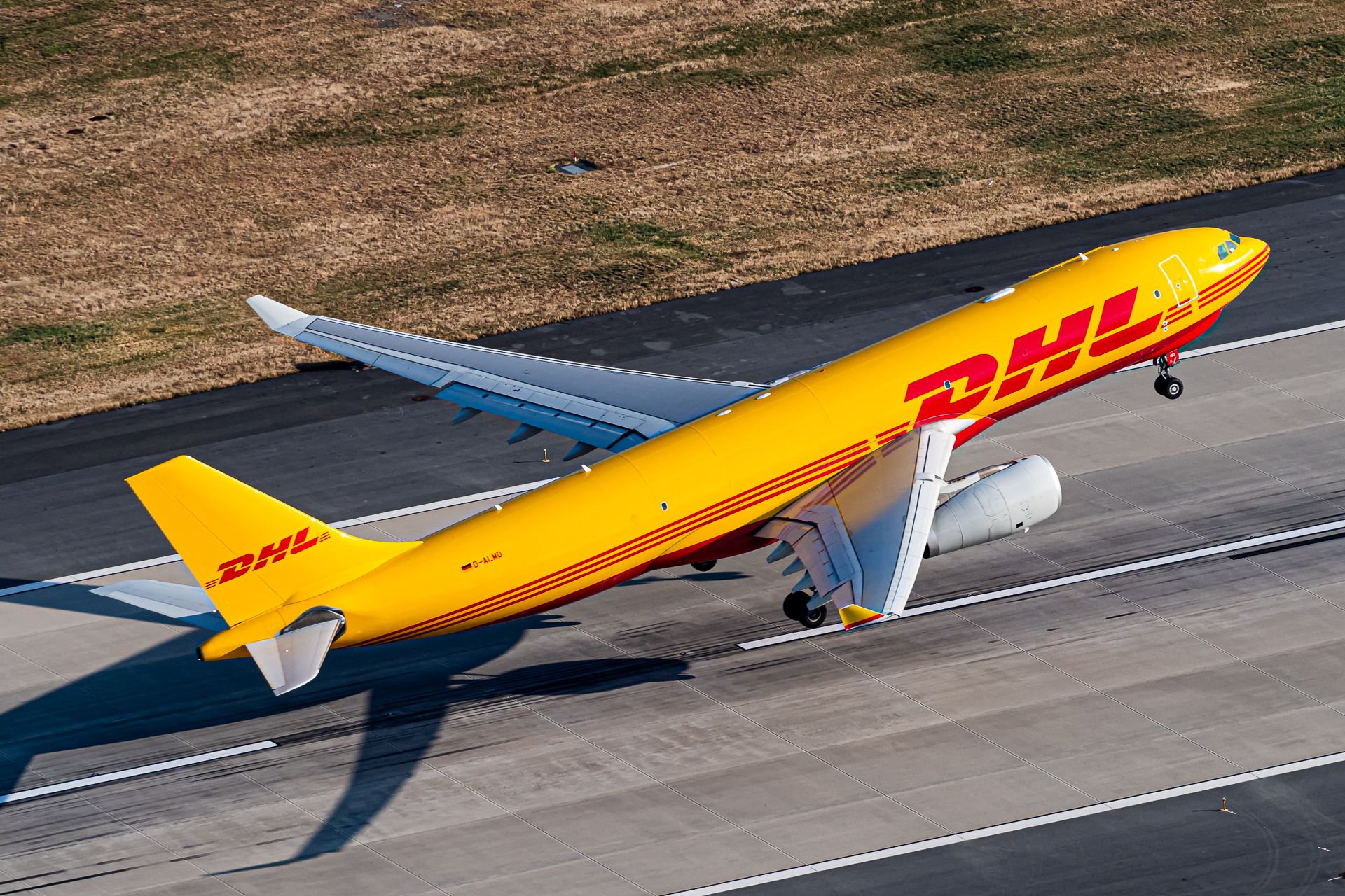 A DHL Airbus A330-243F taking off from JFK Airport.