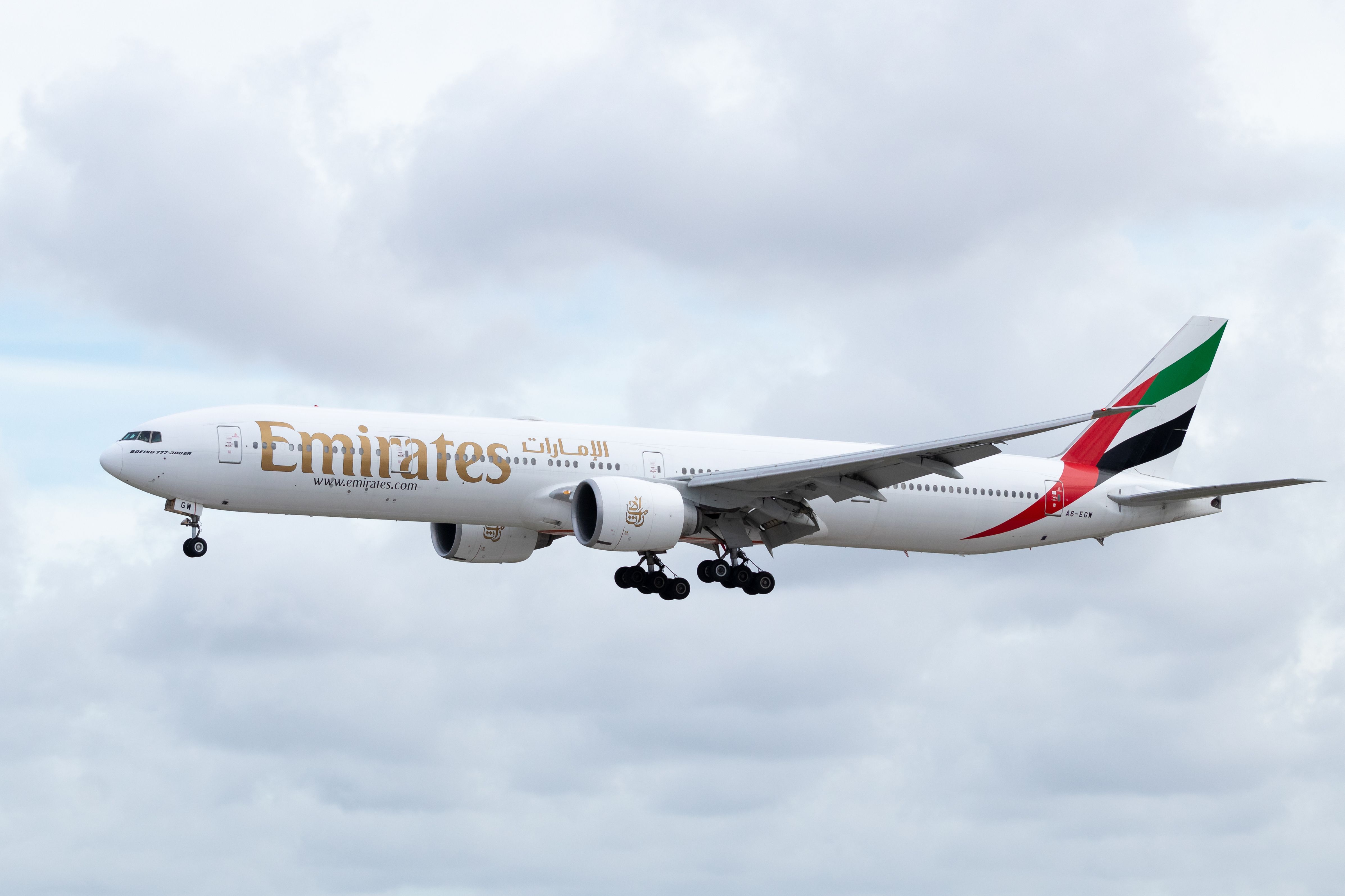 Emirates Boeing 777-300ER landing at Miami International Airport MIA shutterstock_1987252919