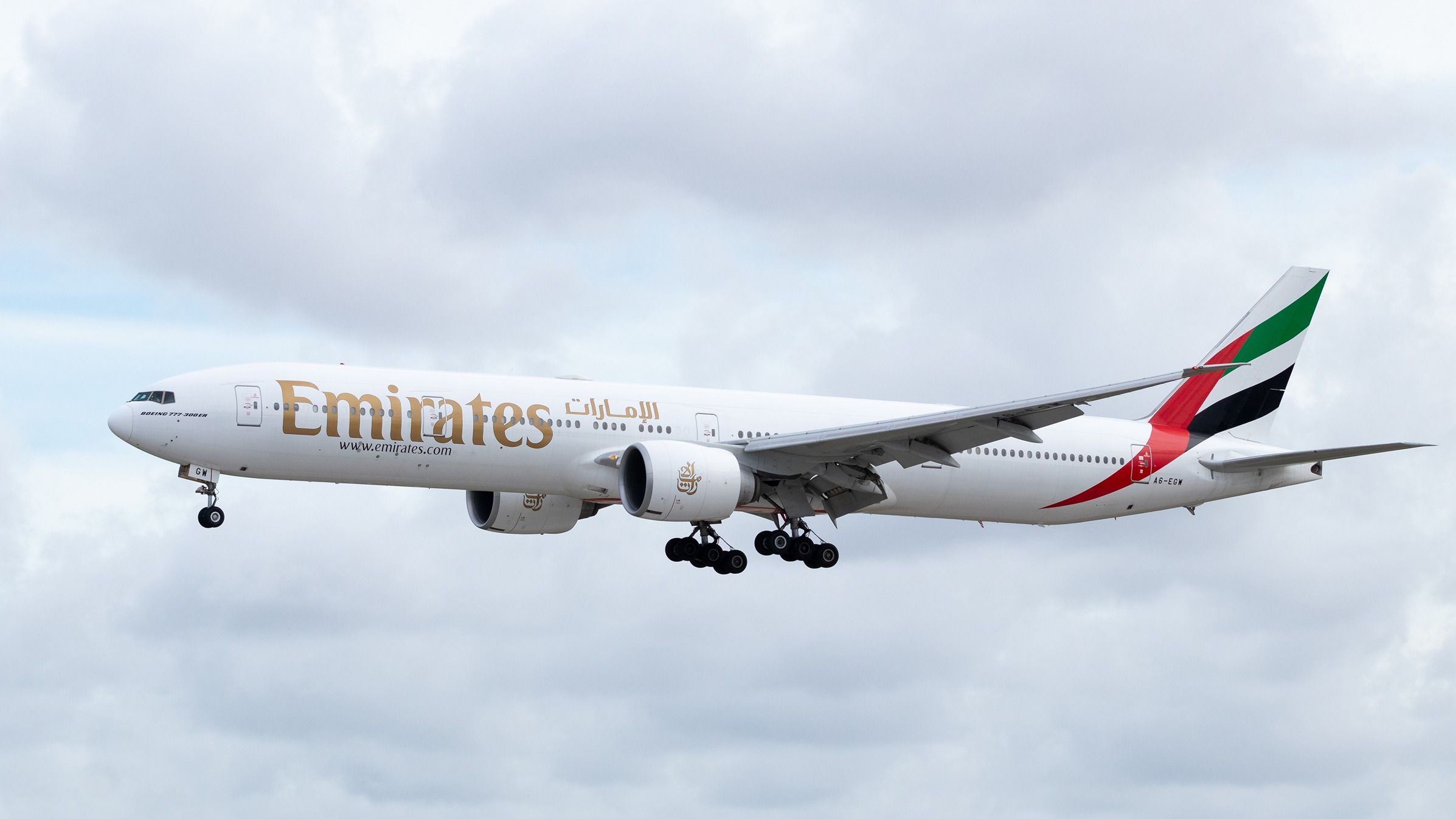 Emirates Boeing 777-300ER final approach shutterstock_1987252919