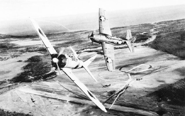 Watercolor of a dogfight between a U.S. Marine Wildcat and a Japanese Zero over Henderson Field on Guadalcanal.