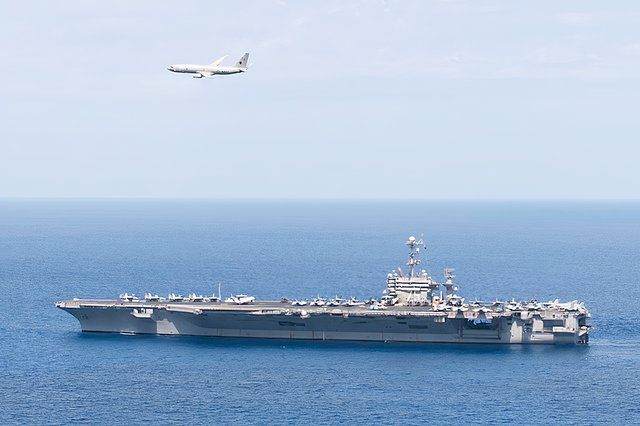 P-8 Over Carrier