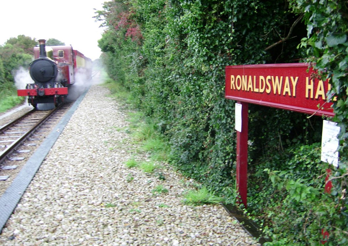 Isle Of Man Airport Railway Station With Narrow Gauge Steam Train Arriving