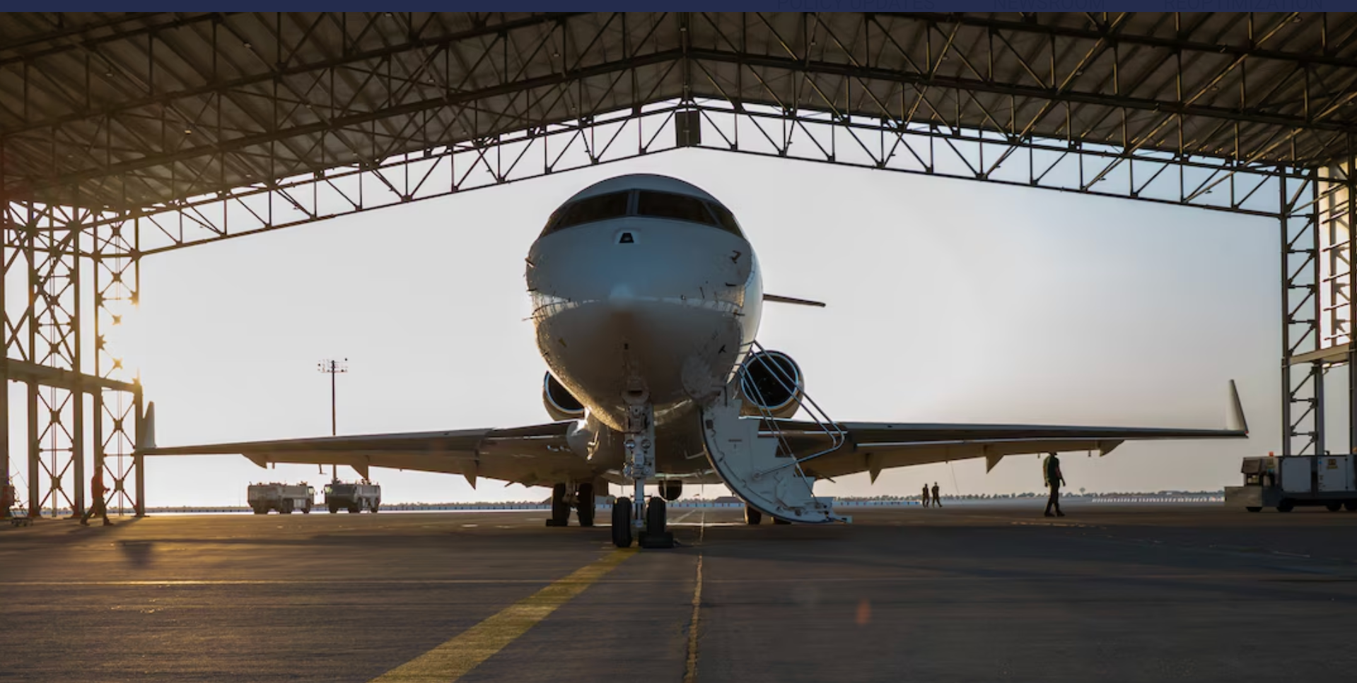 Photo of an E-11A in an open hangar