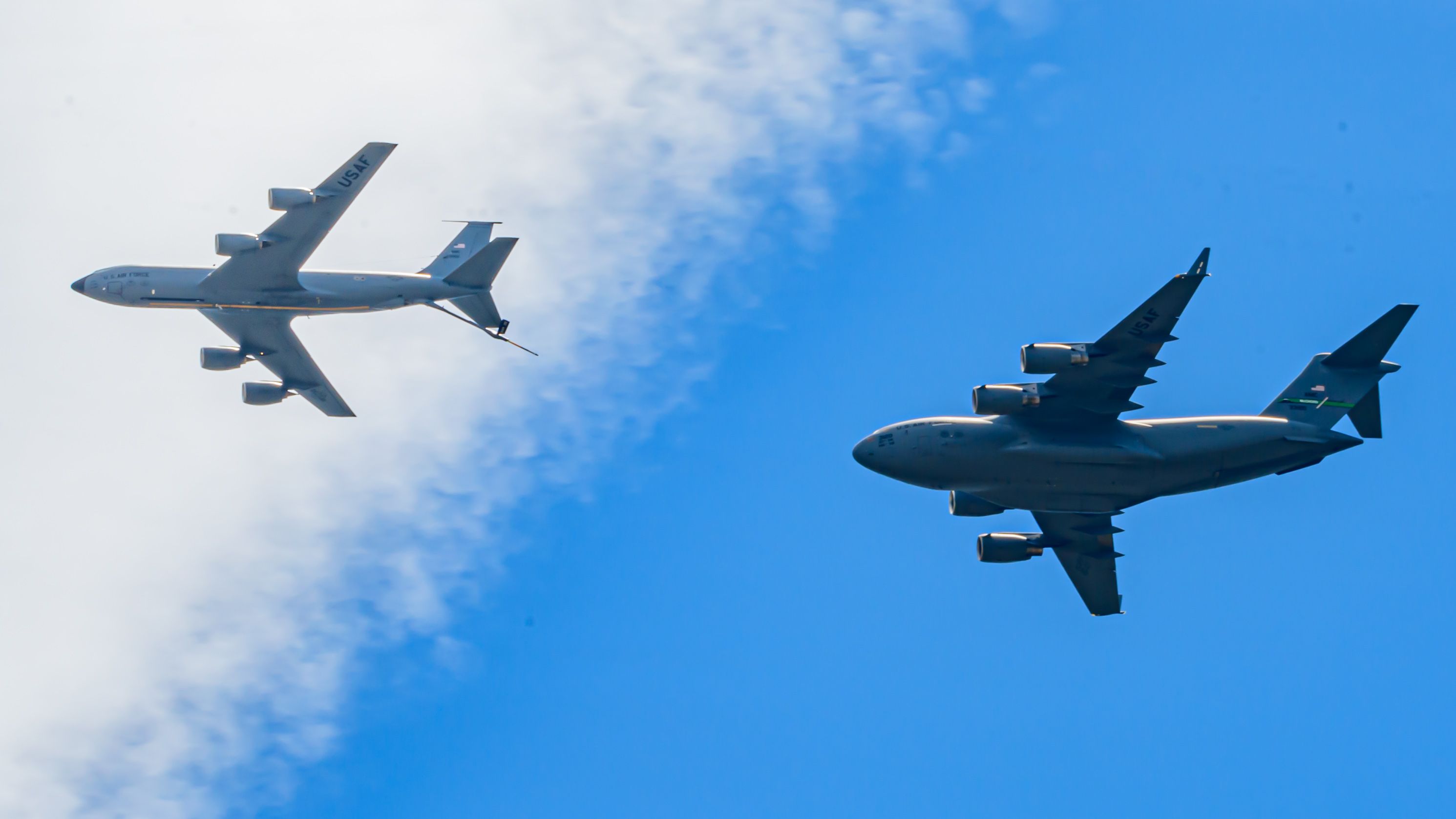 Looking Up at C-17 in Pre-Contact With KC-135 Under Cirrus Cloud - 16x9