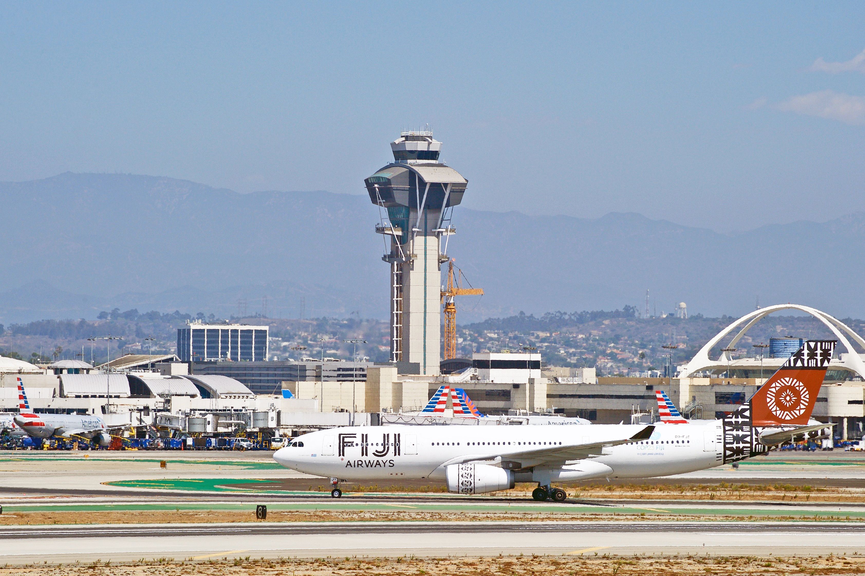 Fiji Airways Airbus aircraft taxiing along the runway upon arrival at Los Angeles International Airport. Los Angeles, California USA