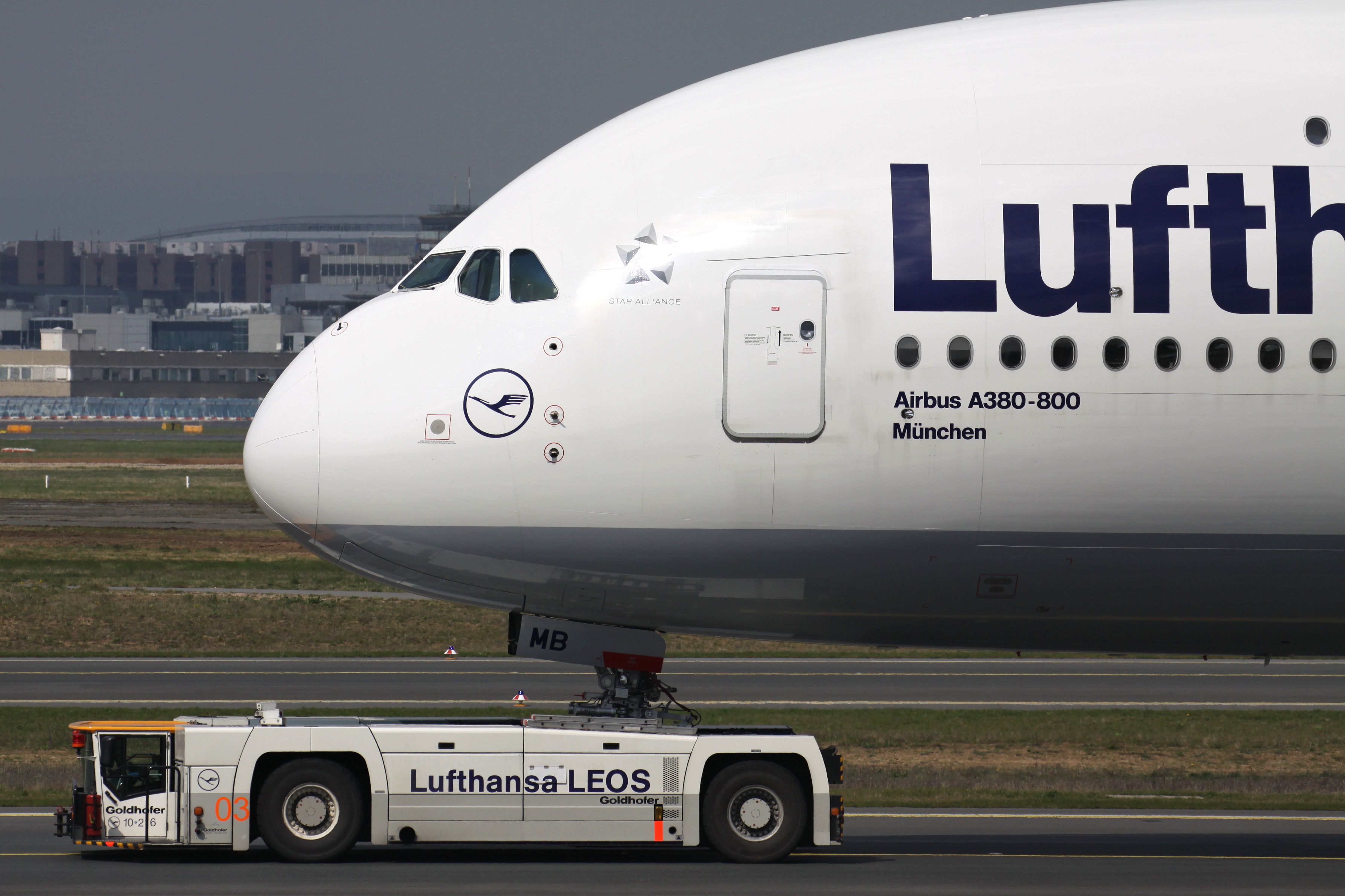 FRANKFURT AM MAIN, GERMANY - APRIL 13, 2012: Lufthansa Airbus A380 with registration D-AIMB being towed to terminal at Frankfurt Airport.