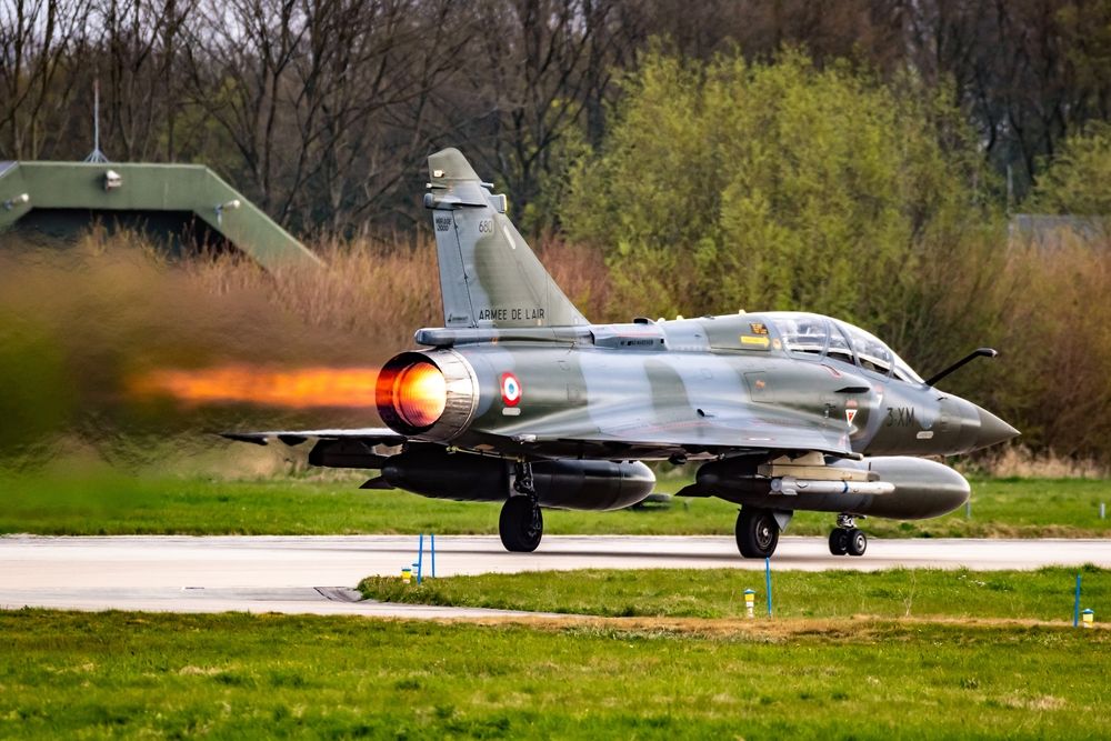 French Air Force Dassault Mirage 2000 fighter jet plane afterburner take-off