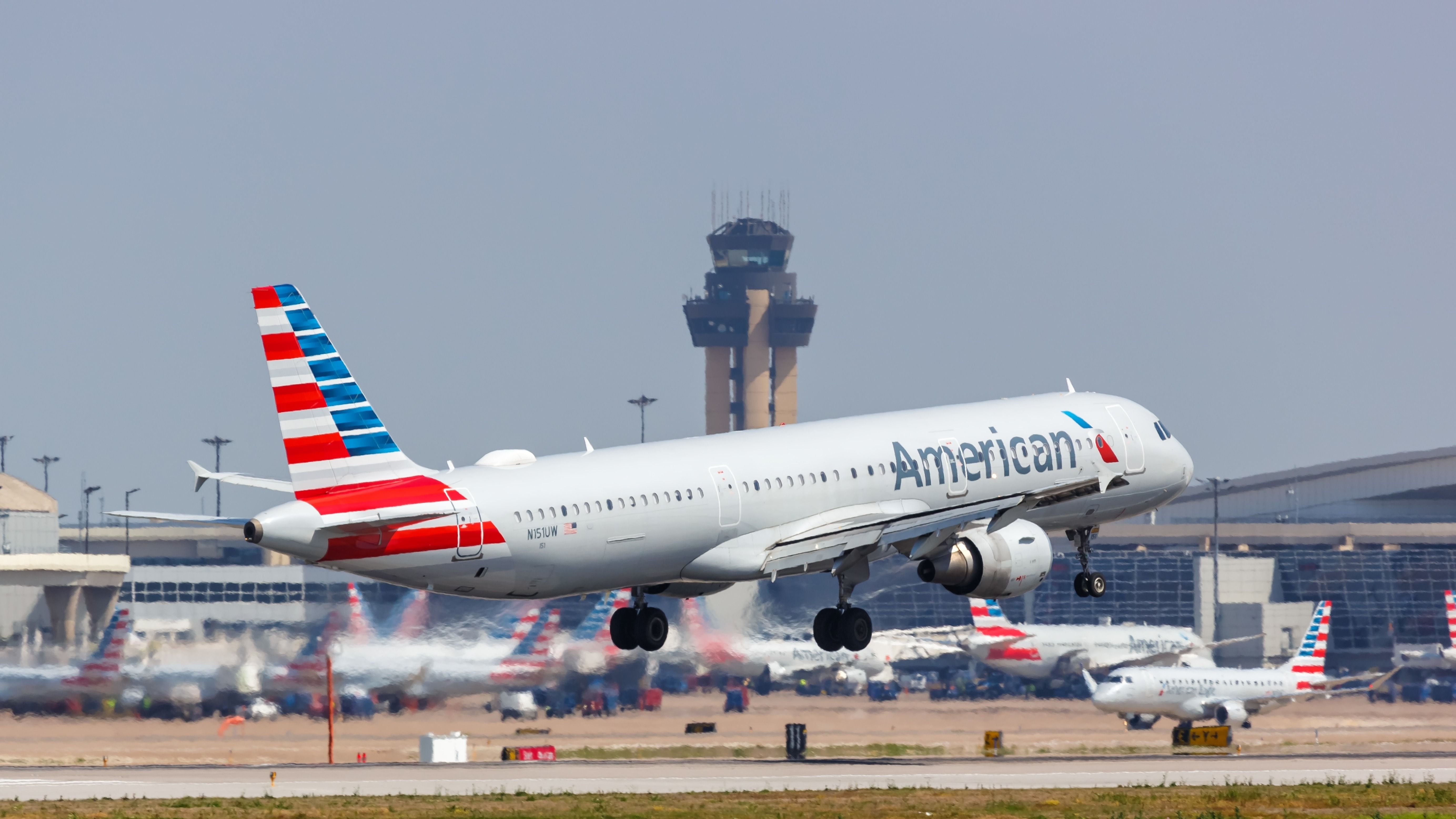 An American Airline plane takes off at DFW