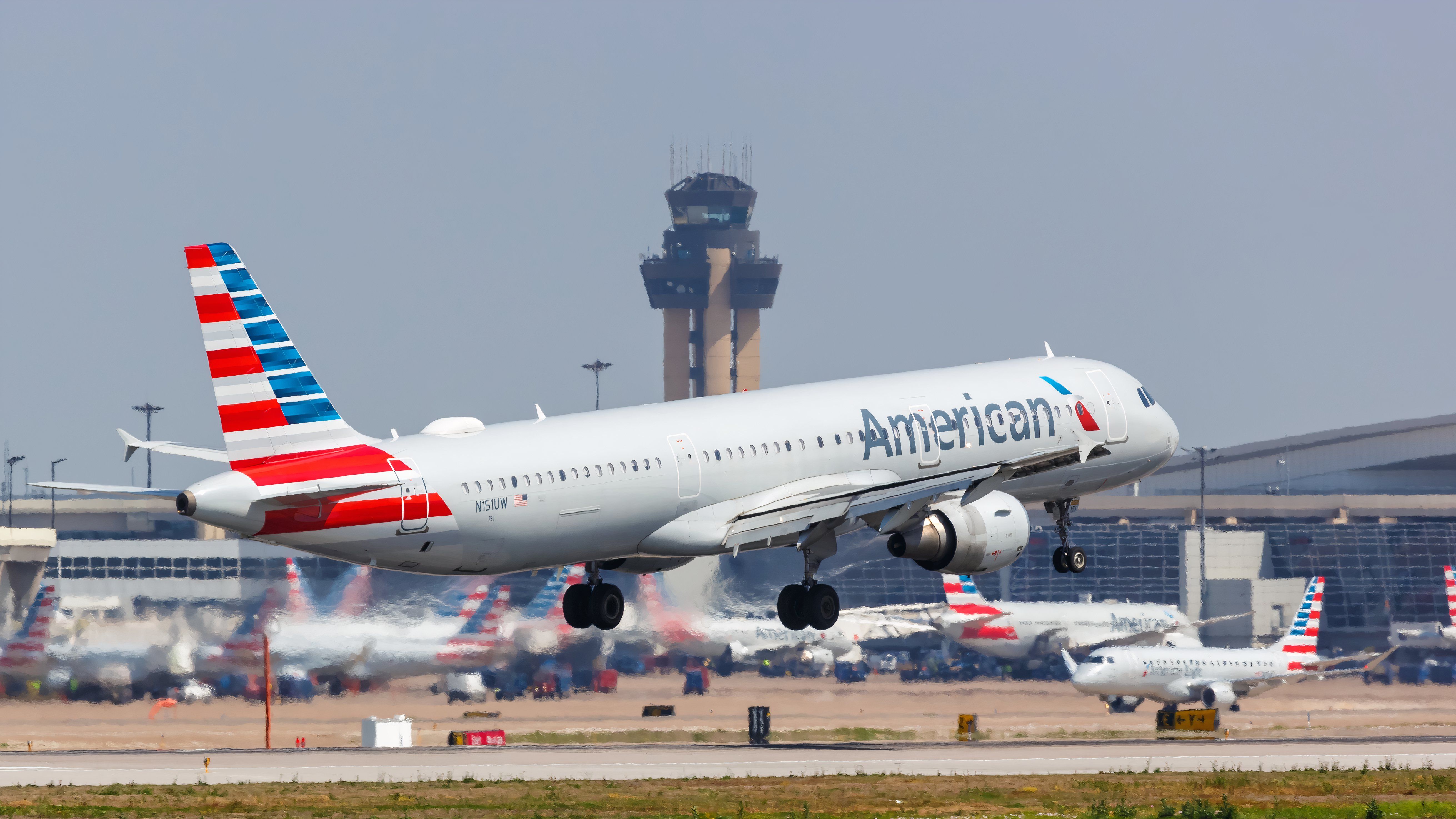 An American Airlines plane takes off at DFW