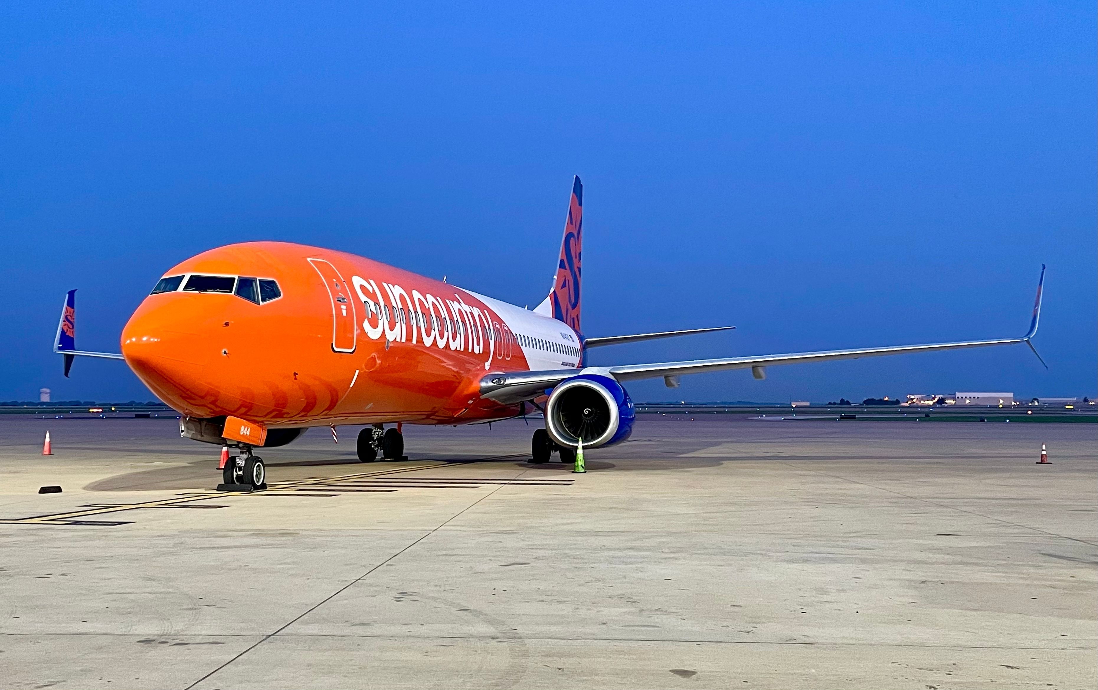 A Sun Country Airlines Boeing 737 parked at Dallas Fort Worth
