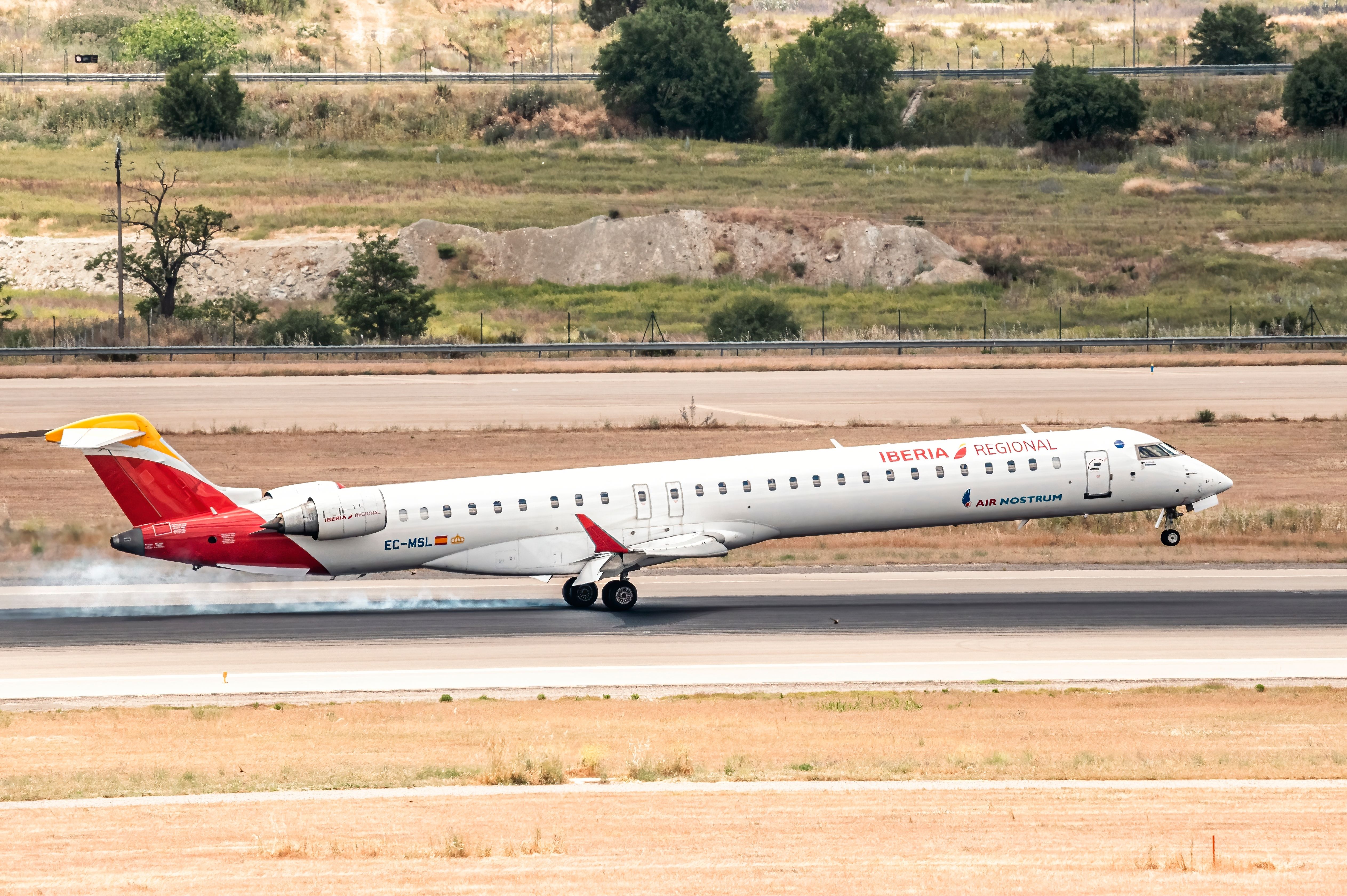 Iberia Regional CRJ-1000 aircraft landing.