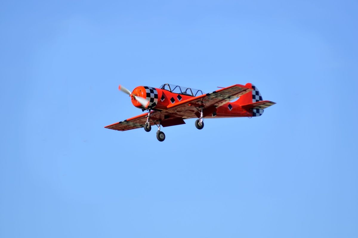 Red Yak-52 flying