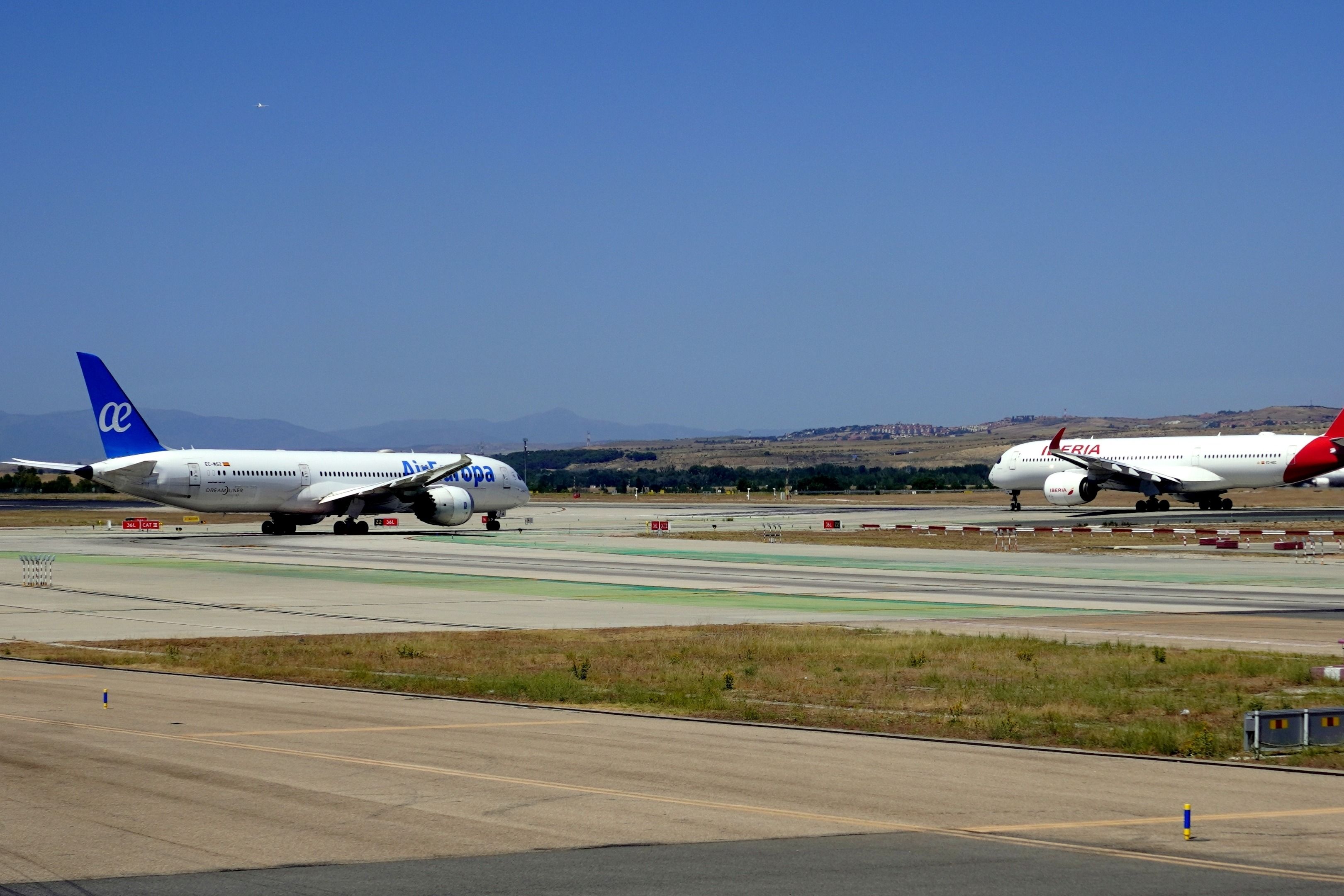 Air Europa and Iberia widebody aircraft at MAD shutterstock_2347781085