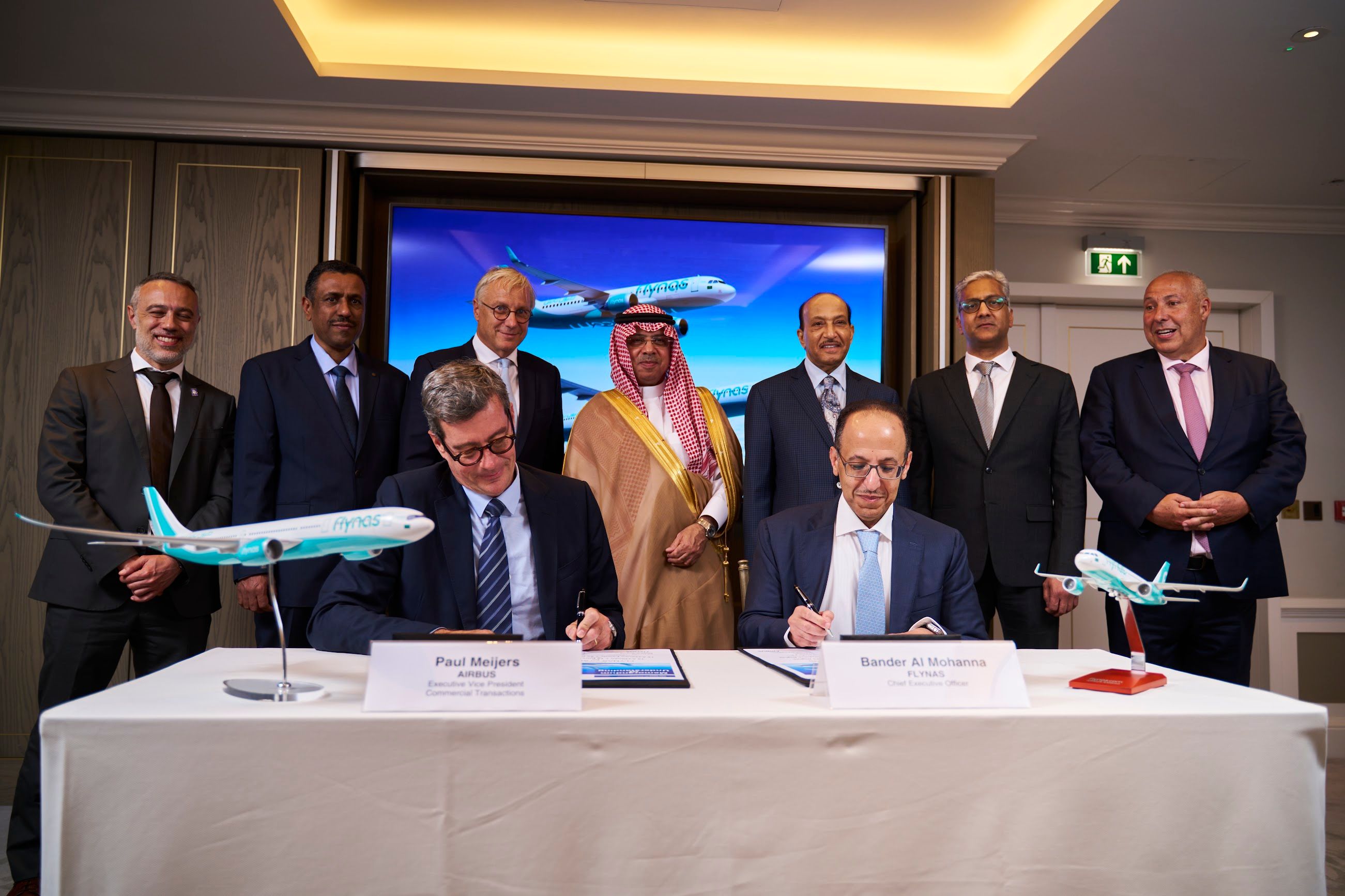 Airbus and flynas executives signing an MoU for 90 aircraft