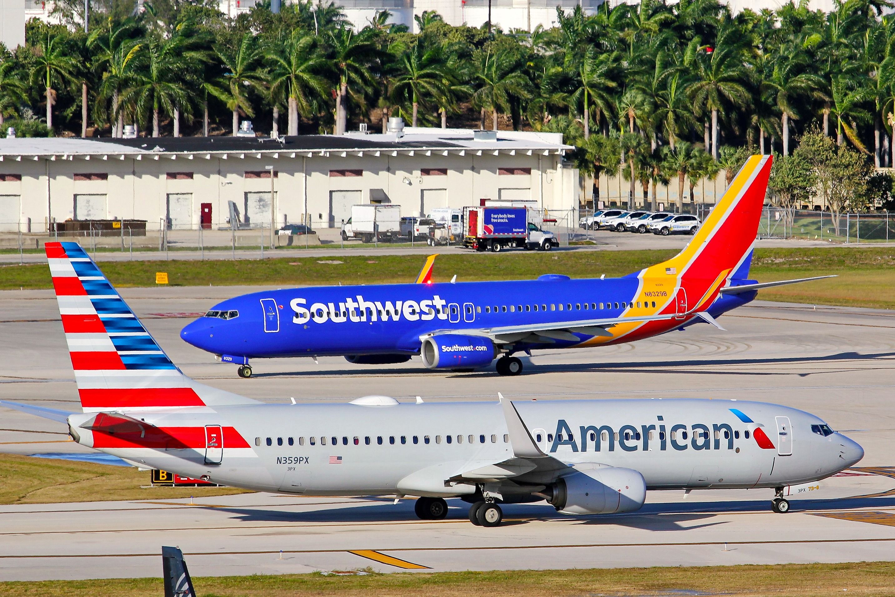 American Airlines and Southwest Airlines Boeing 737 aircraft at FLL shutterstock_1824287981