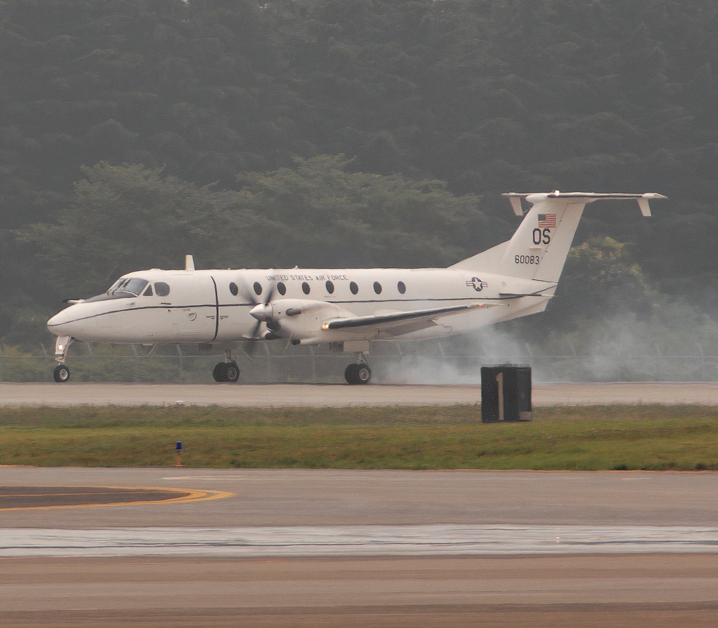 A U.S. Air Force Beech C-12J Huron lands at Yokota Air Base, Japan,