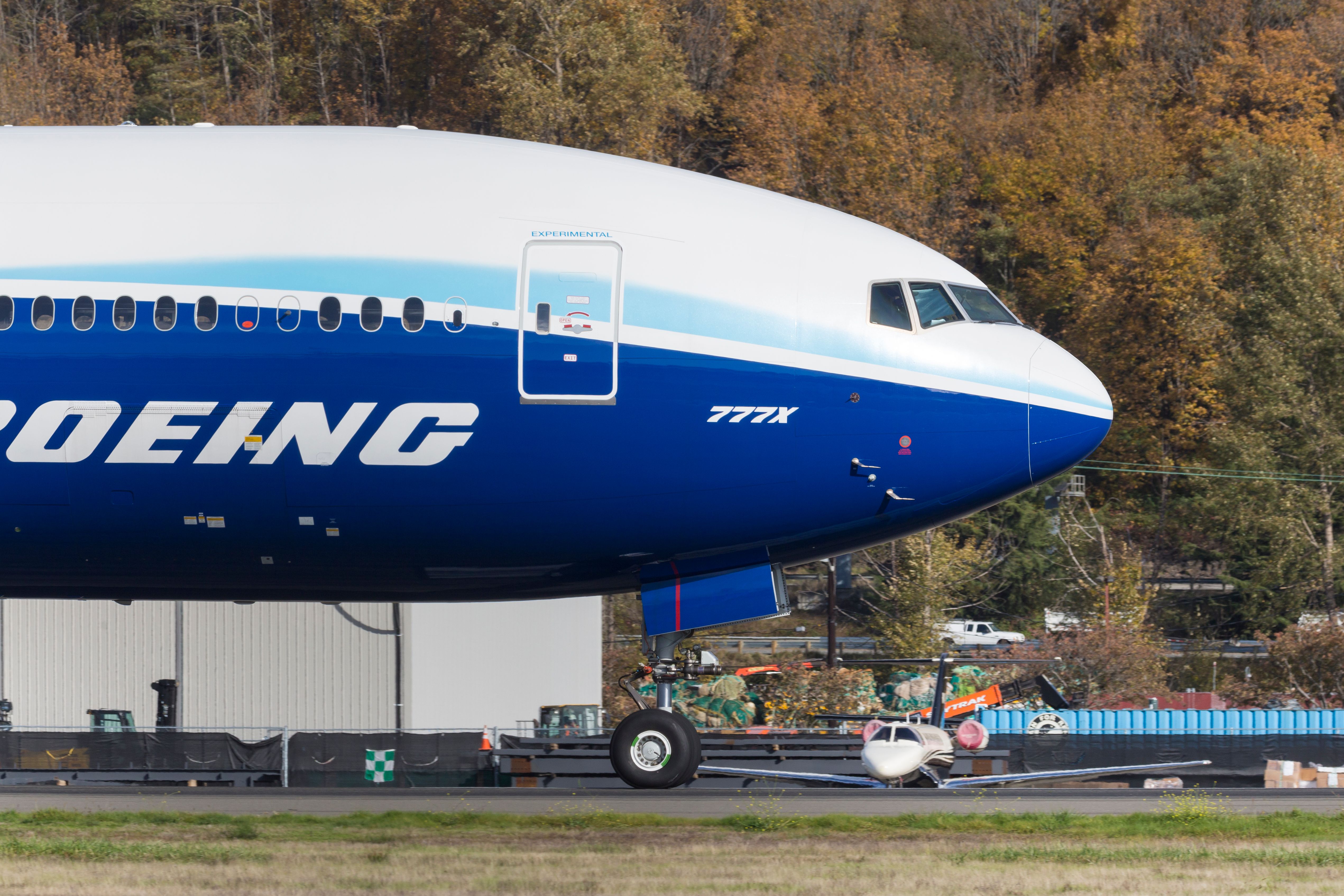 Boeing 777X taxiing on the runway shutterstock_1846883368