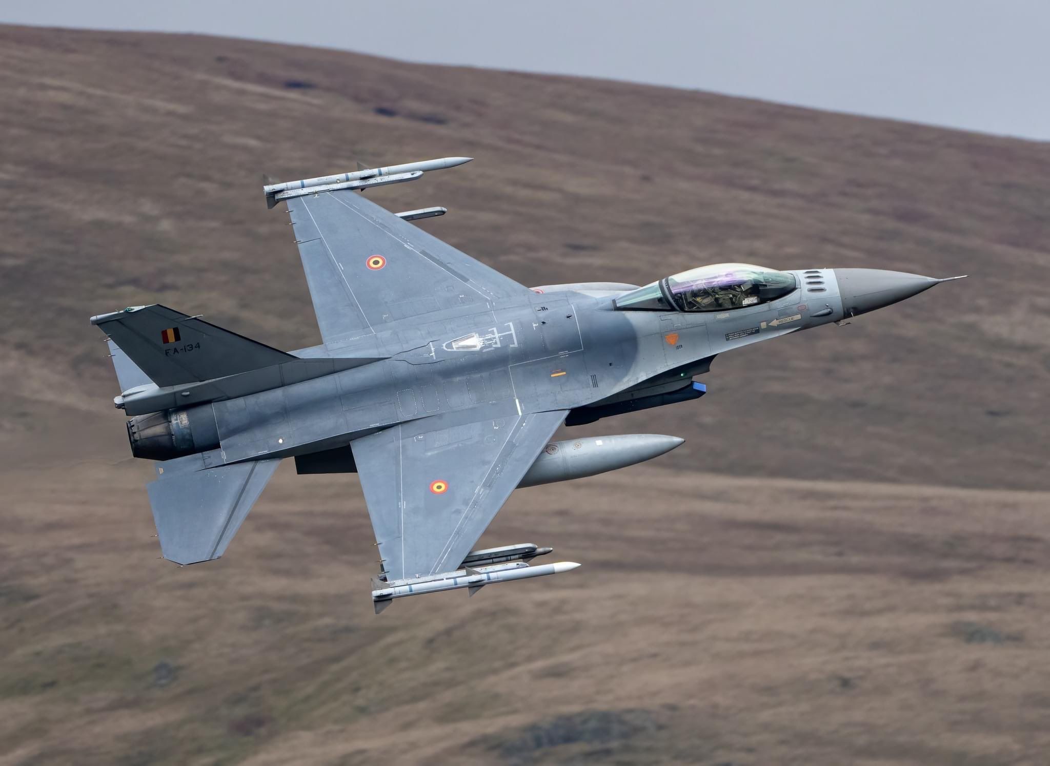 A Belgian F-16 aircraft in the sky