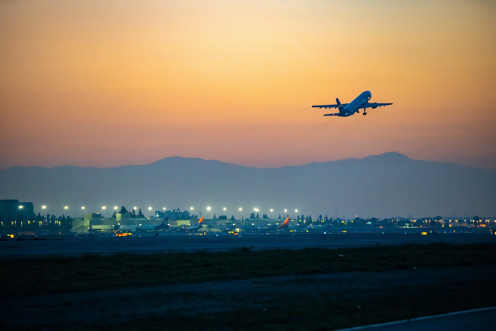 A plane departs Ontario International Airport (ONT) in Southern California