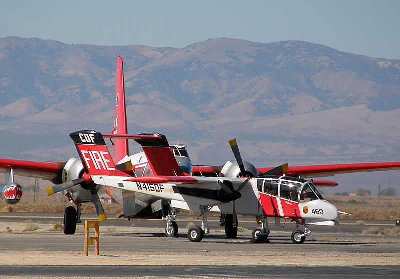 OV-10 Bromnco -- Air Attack 460 at Fox Field during the October 2007 California wildfires with a Lockheed P2V in background