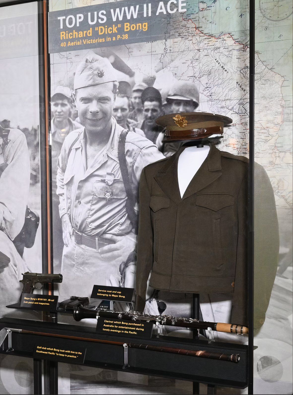 Photo of a museum display case containing items belonging to Richard Bong