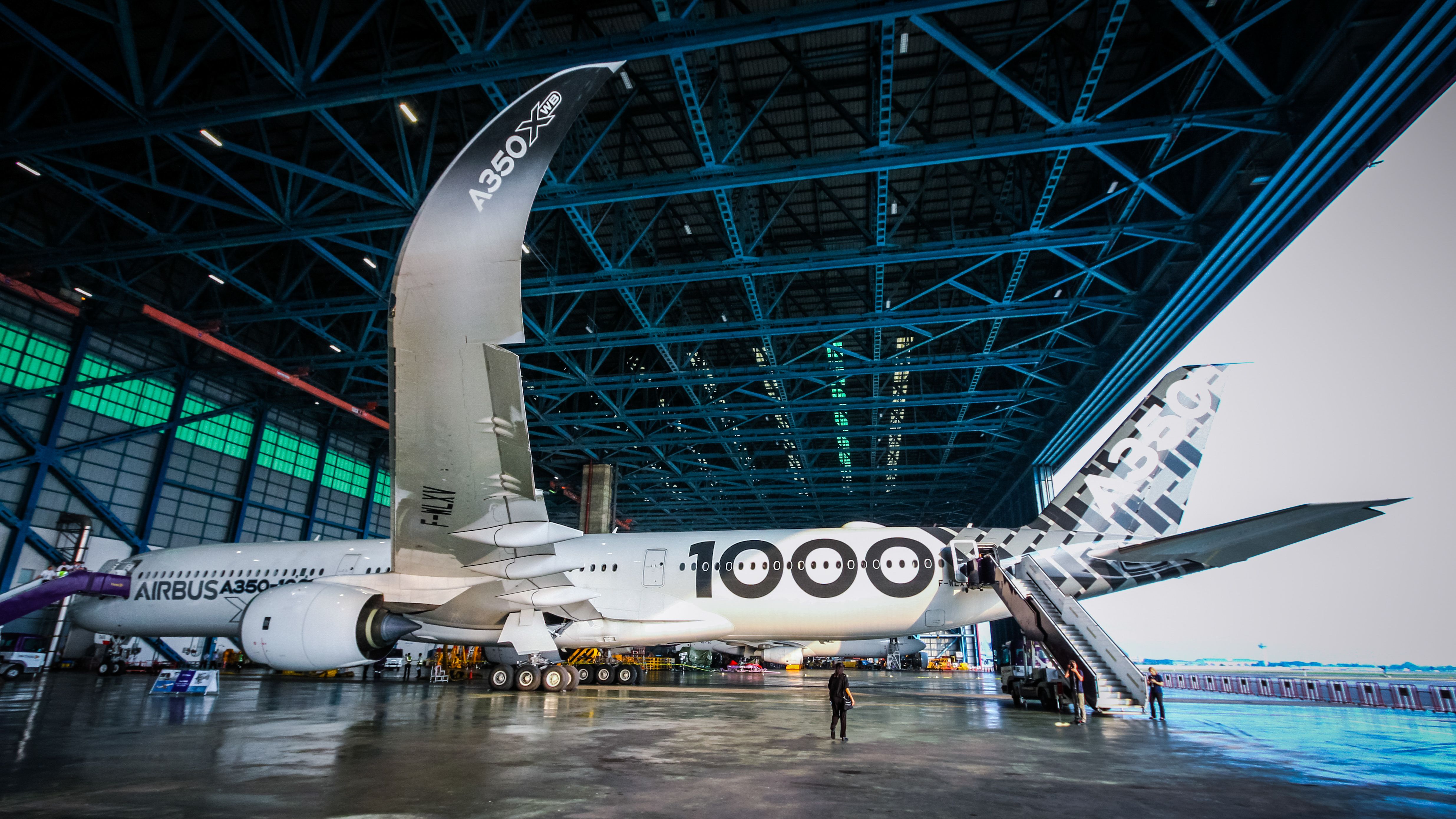 An Airbus A350-1000 parked inside the hangar