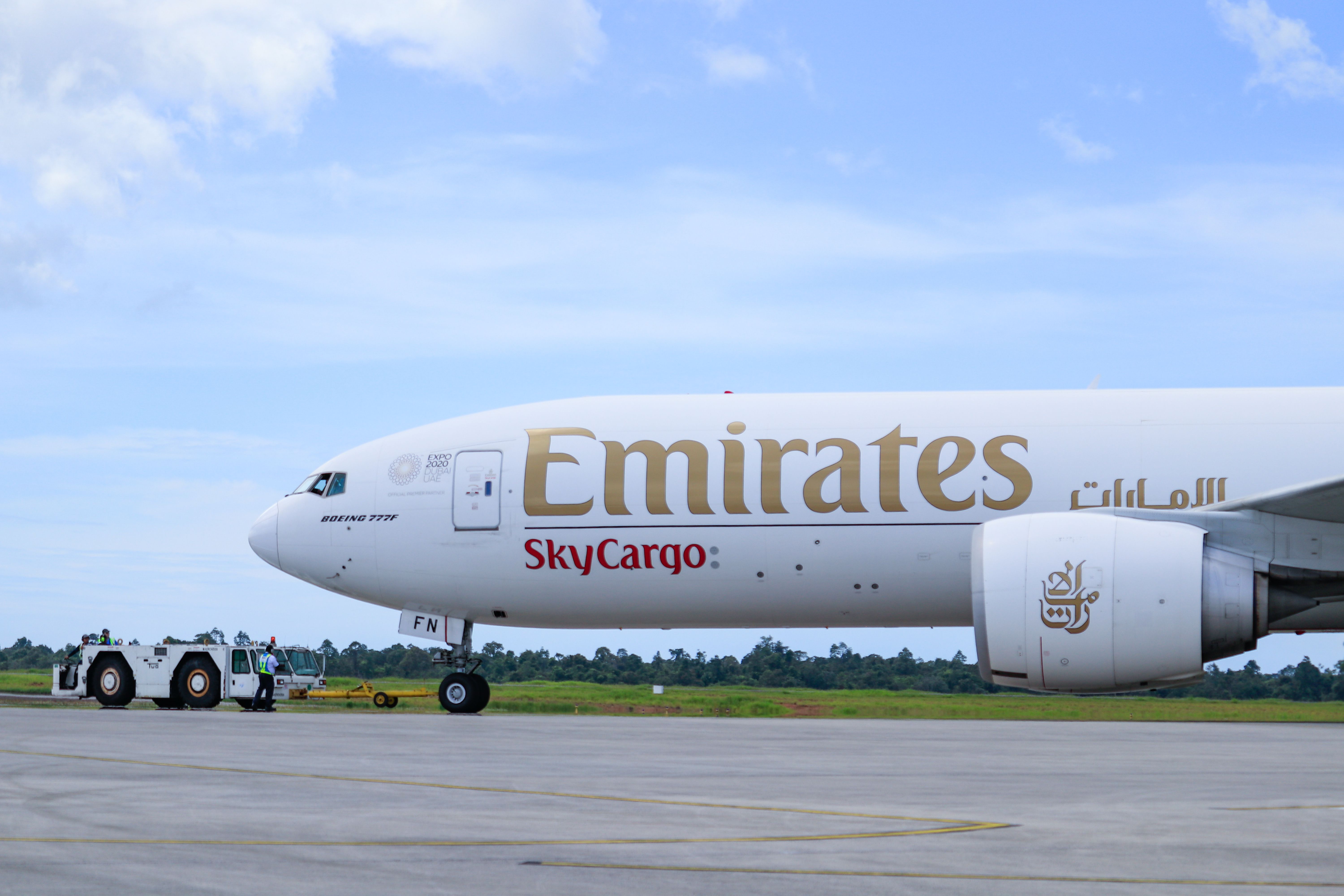 Emirates SkyCargo Boeing 777F With Tug