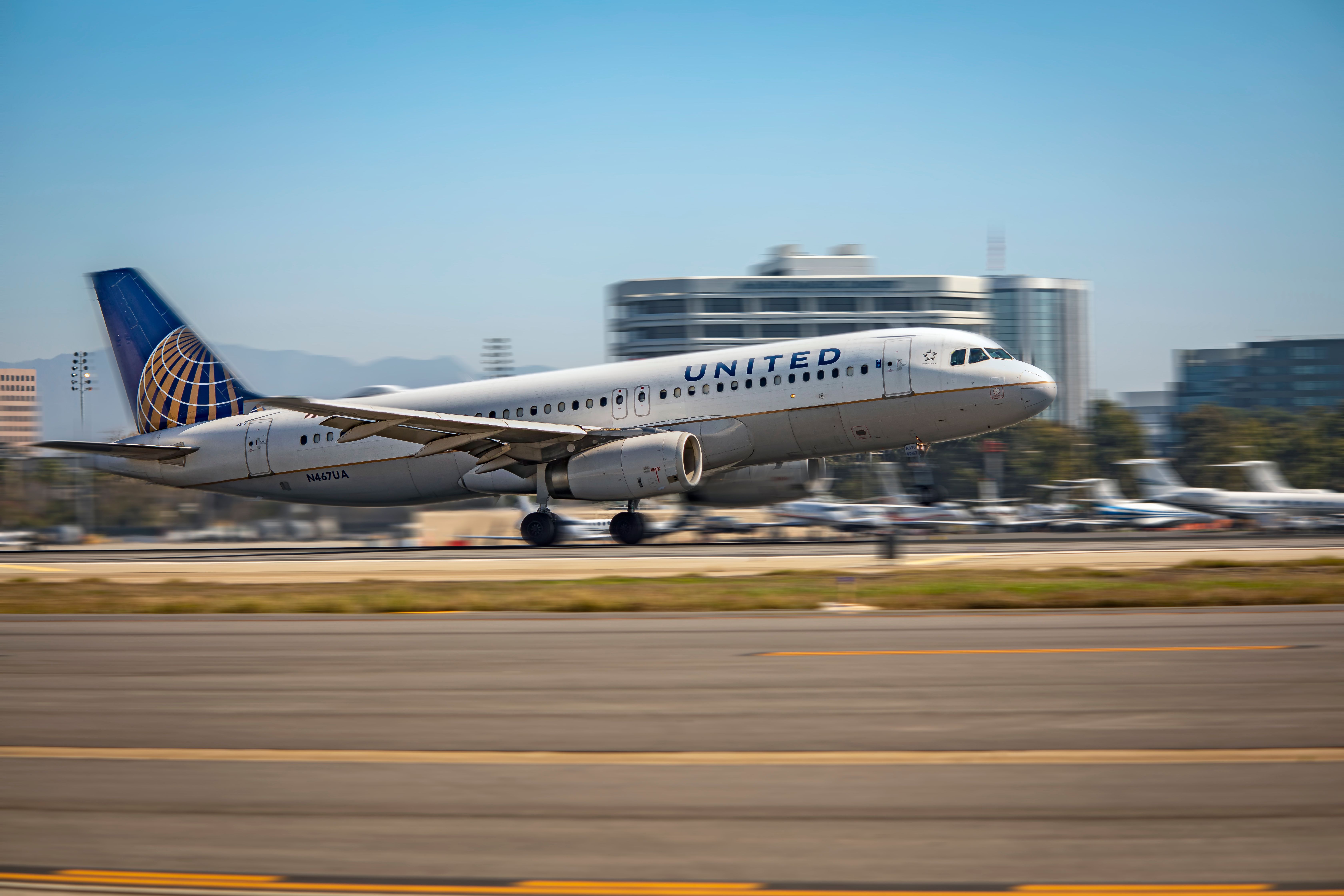 United Airlines Airbus A320 takes off from John Wayne Airport.