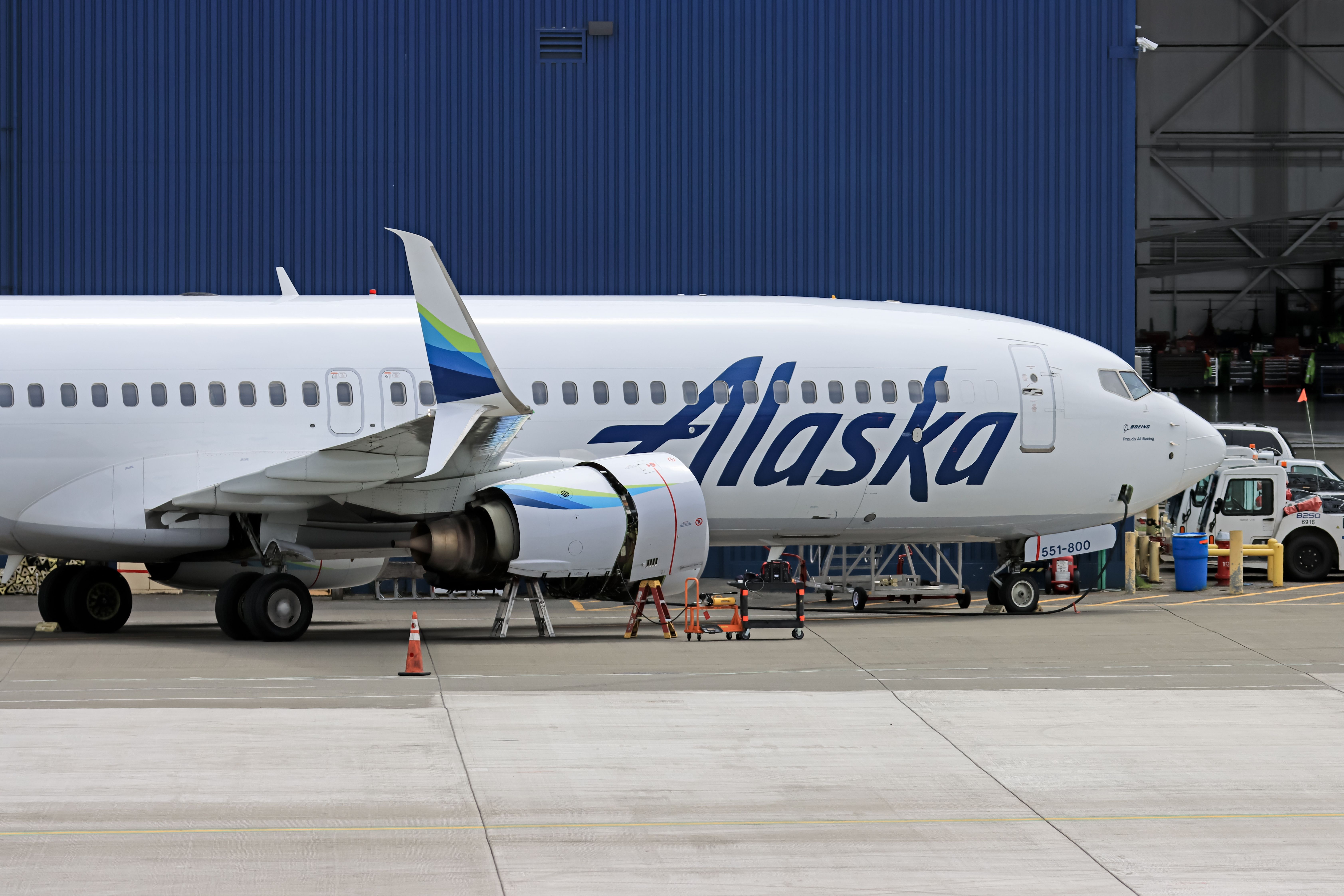 An Alaska Airlines Boeing 737-900ER parked at an airport