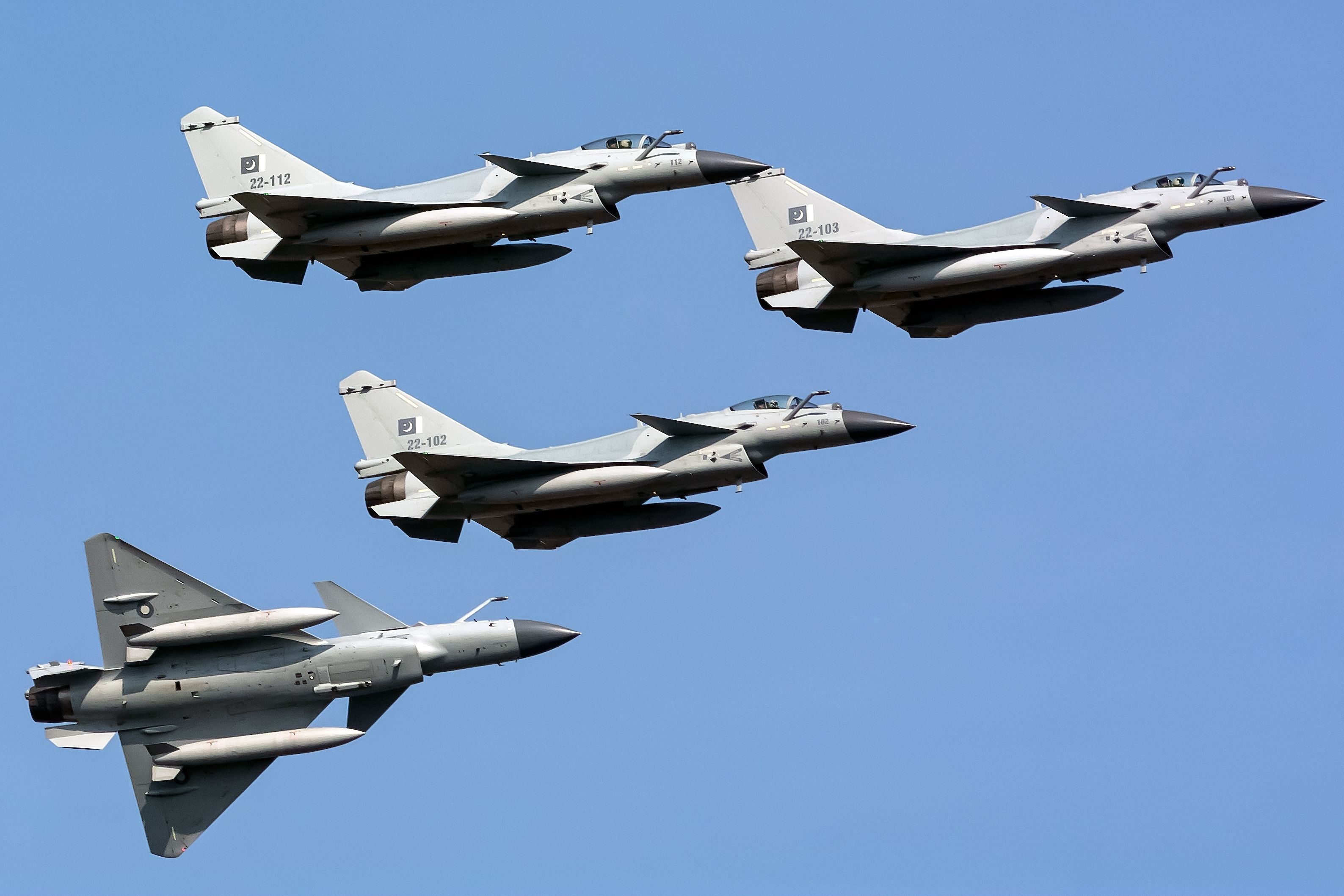 shutterstock_2343879933 - Newly inducted frontline fighter jets by Pakistan Air Force. Formation of Chengdu j-10C fighter jets performing on Pakistan Day Parade.