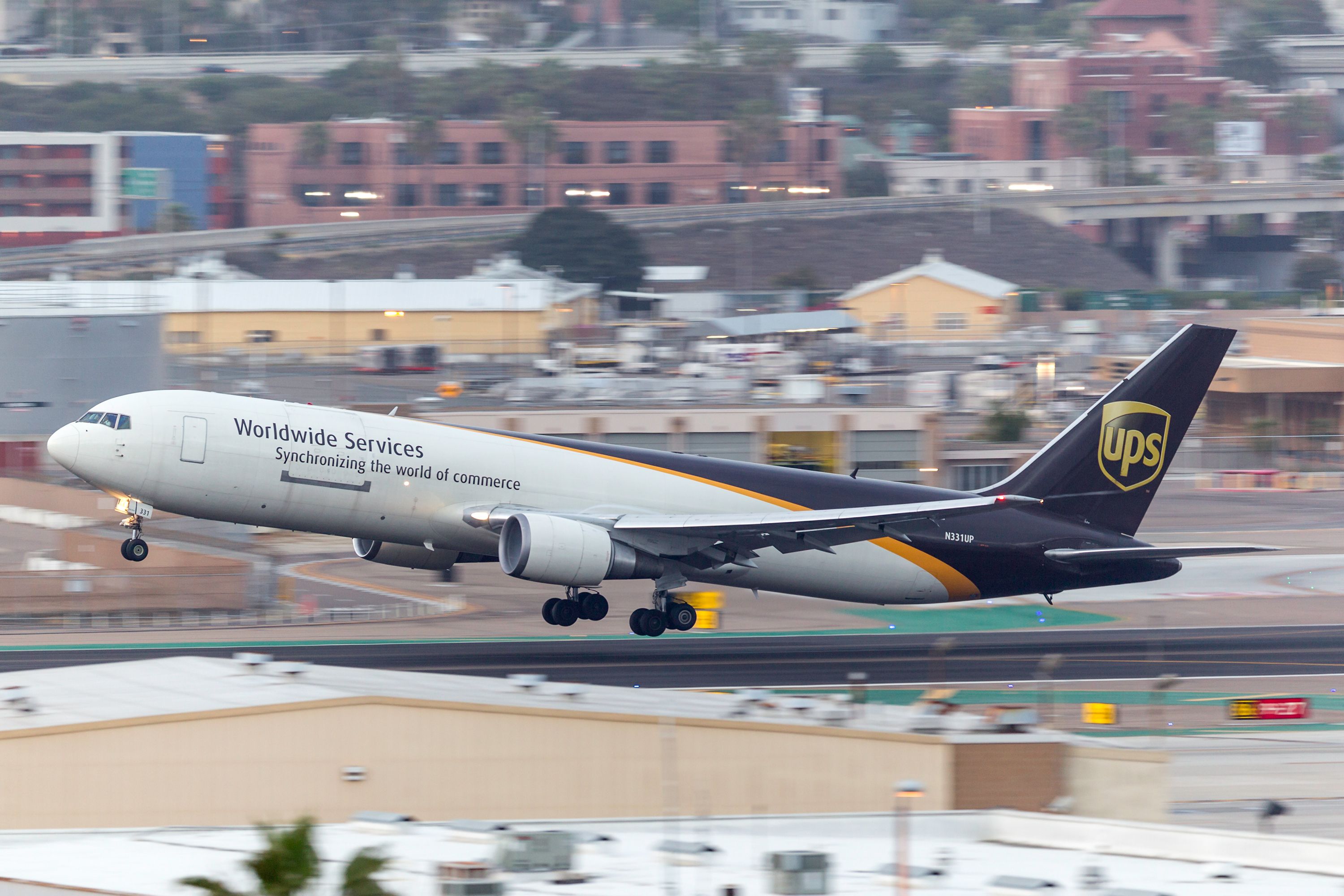 San Diego, California, USA – April 30, 2013. Boeing 767-34AF/ER N331UP of United Parcel Service (UPS) departs San Diego International Airport.