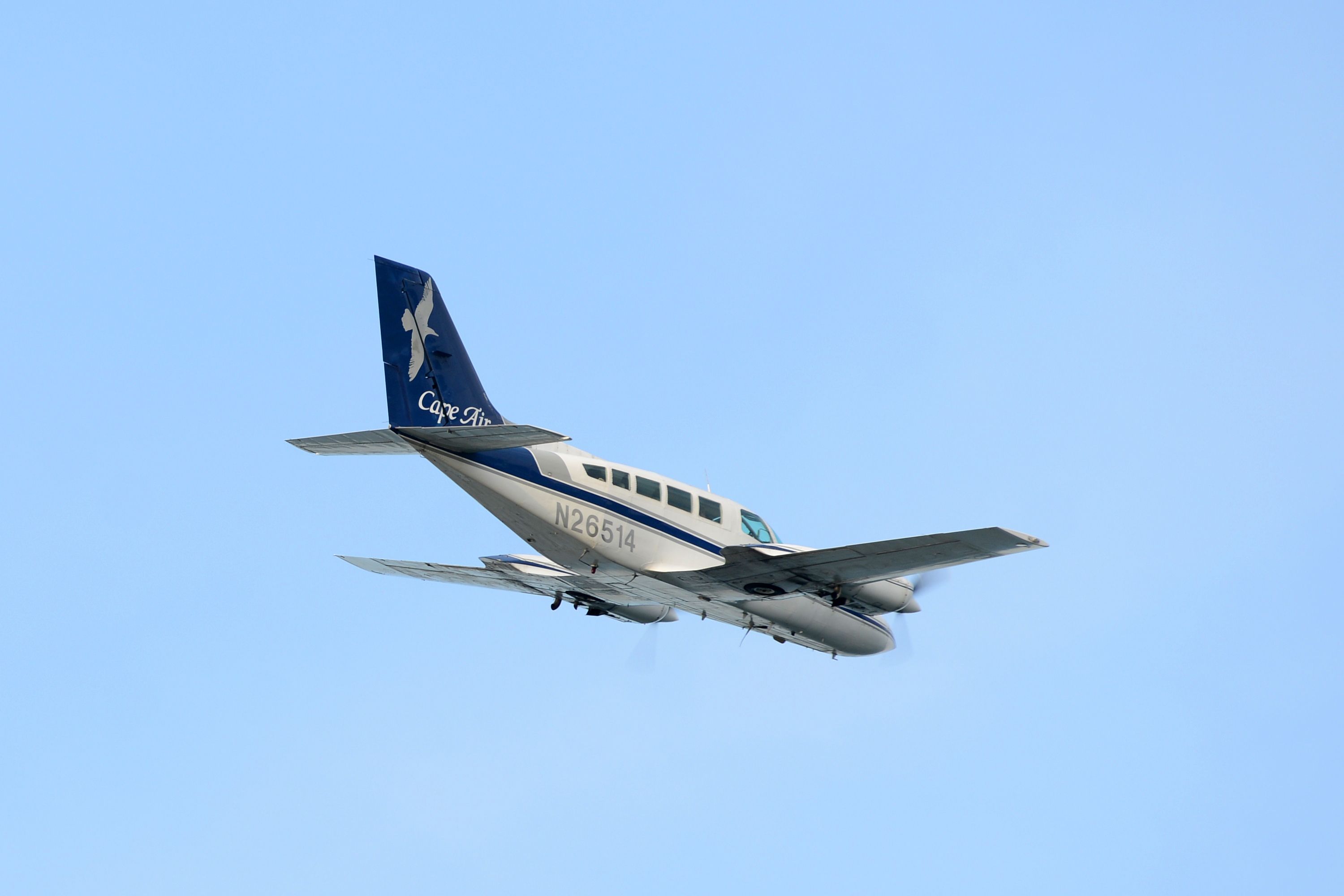 A Cape Air Cessna 402C turboprop flying the sky