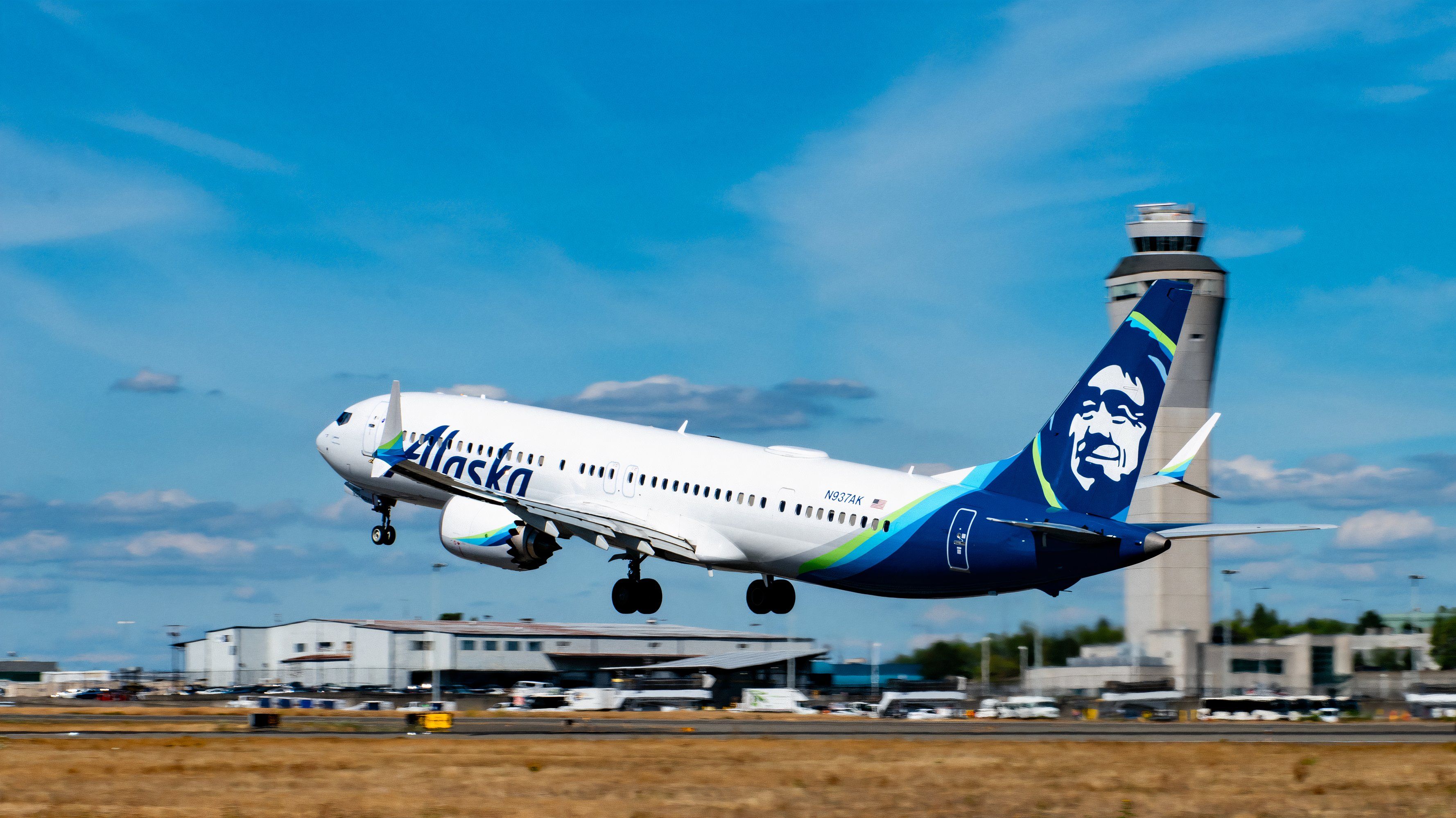 SimpleFlying_737 MAX of Alaska Taking Off In Front of the SEA Tower_20230811-1551-DSC_8259_JAK