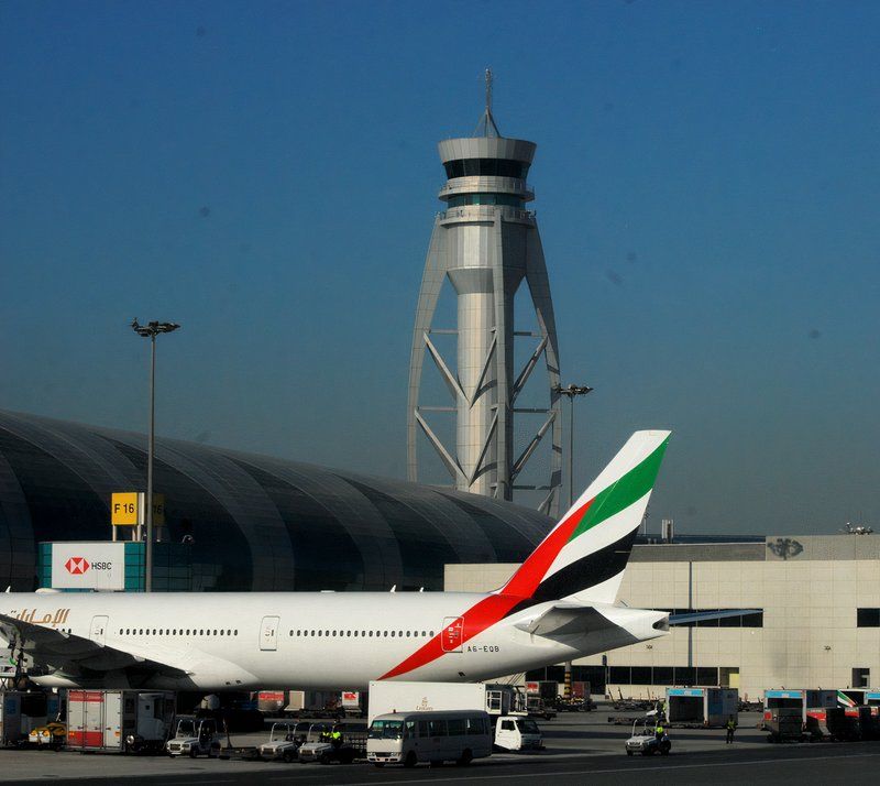 Dubai control tower with 777 nearby 