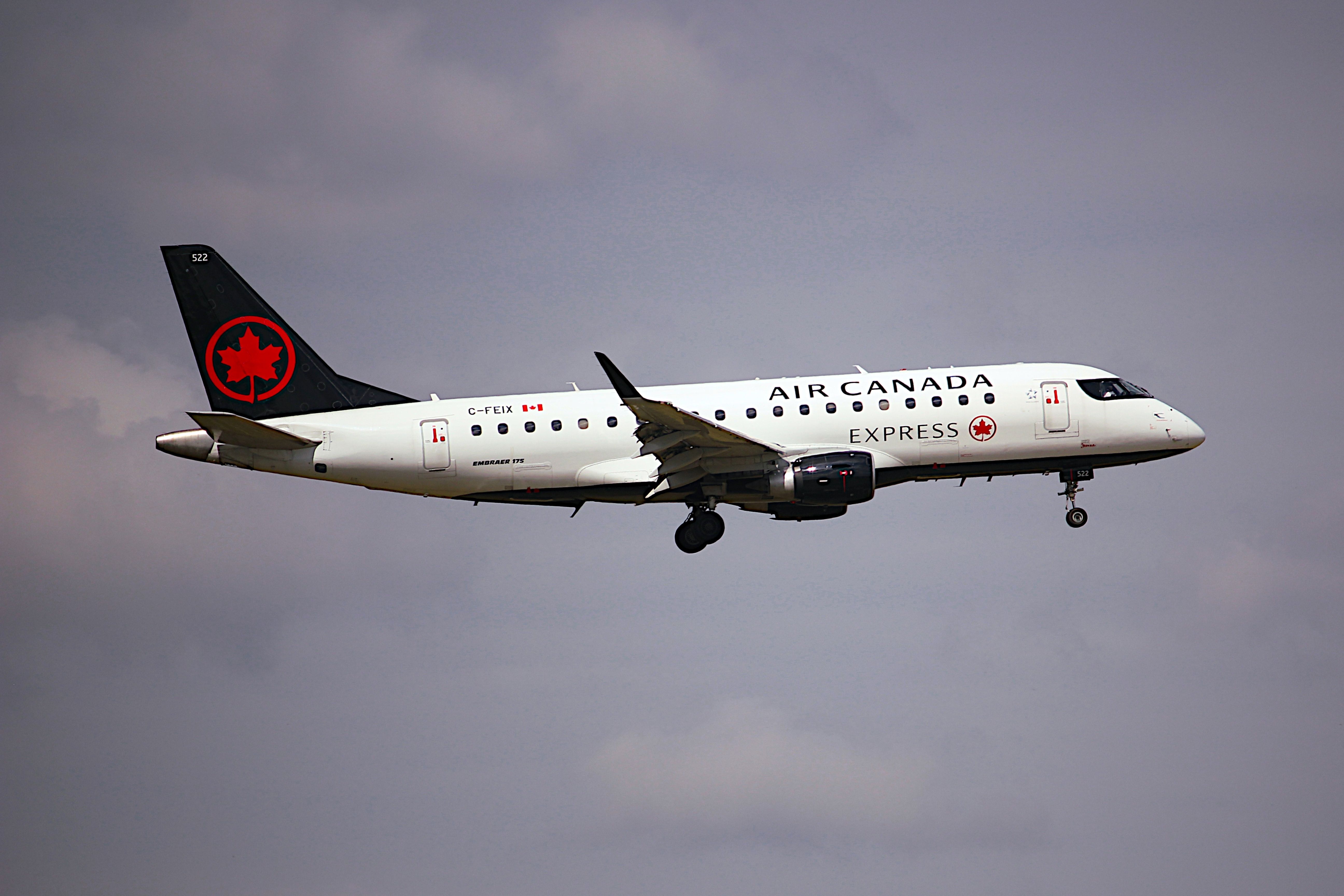 Air Canada Express Embraer E175 landing at YYZ shutterstock_2361247479