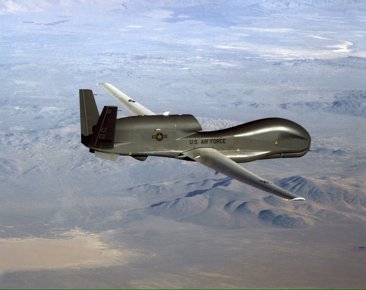 An RQ-4 Global Hawk soars through the sky to record ISR data