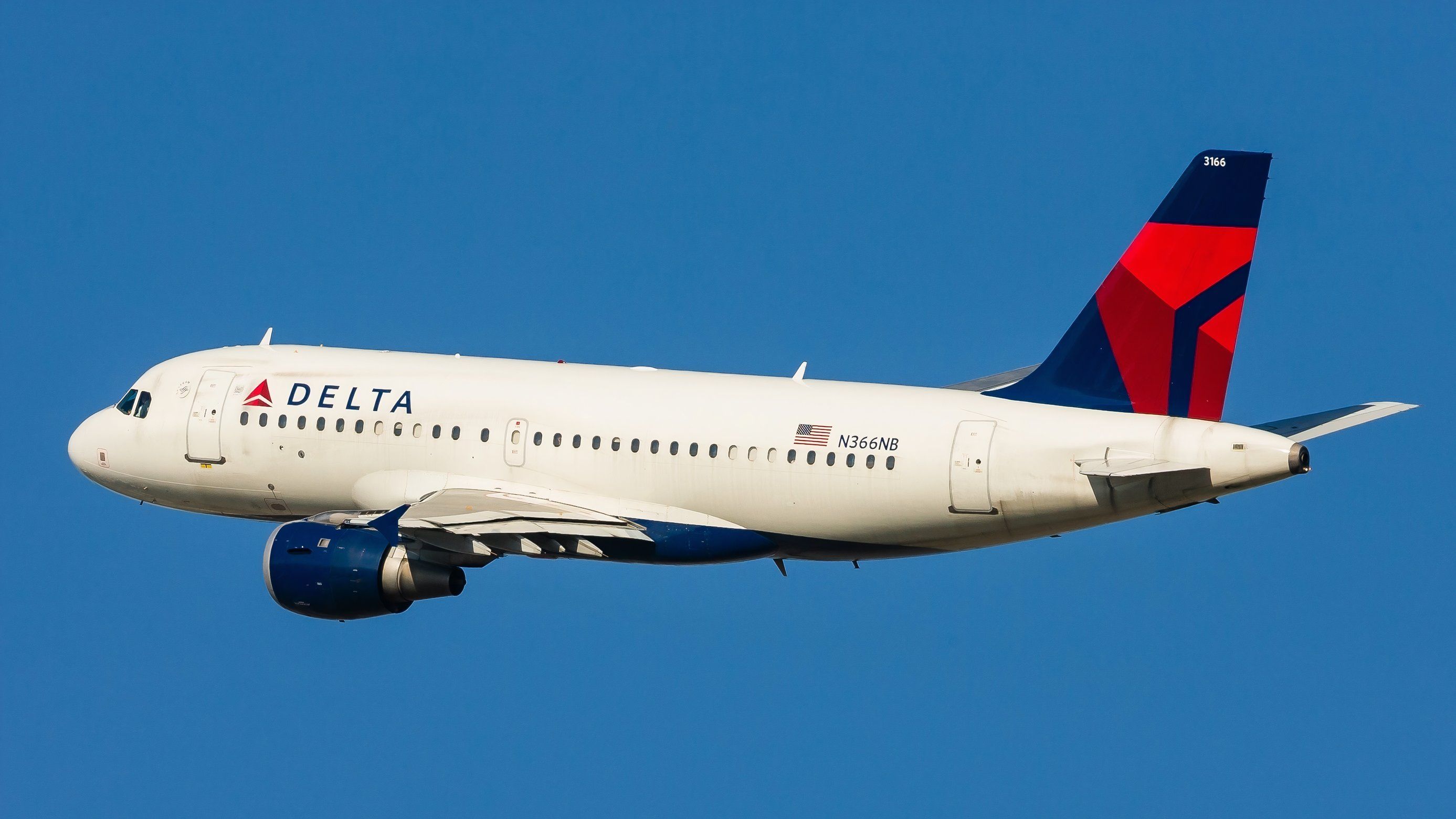 Delta A319 climbs1 shutterstock_2326990919