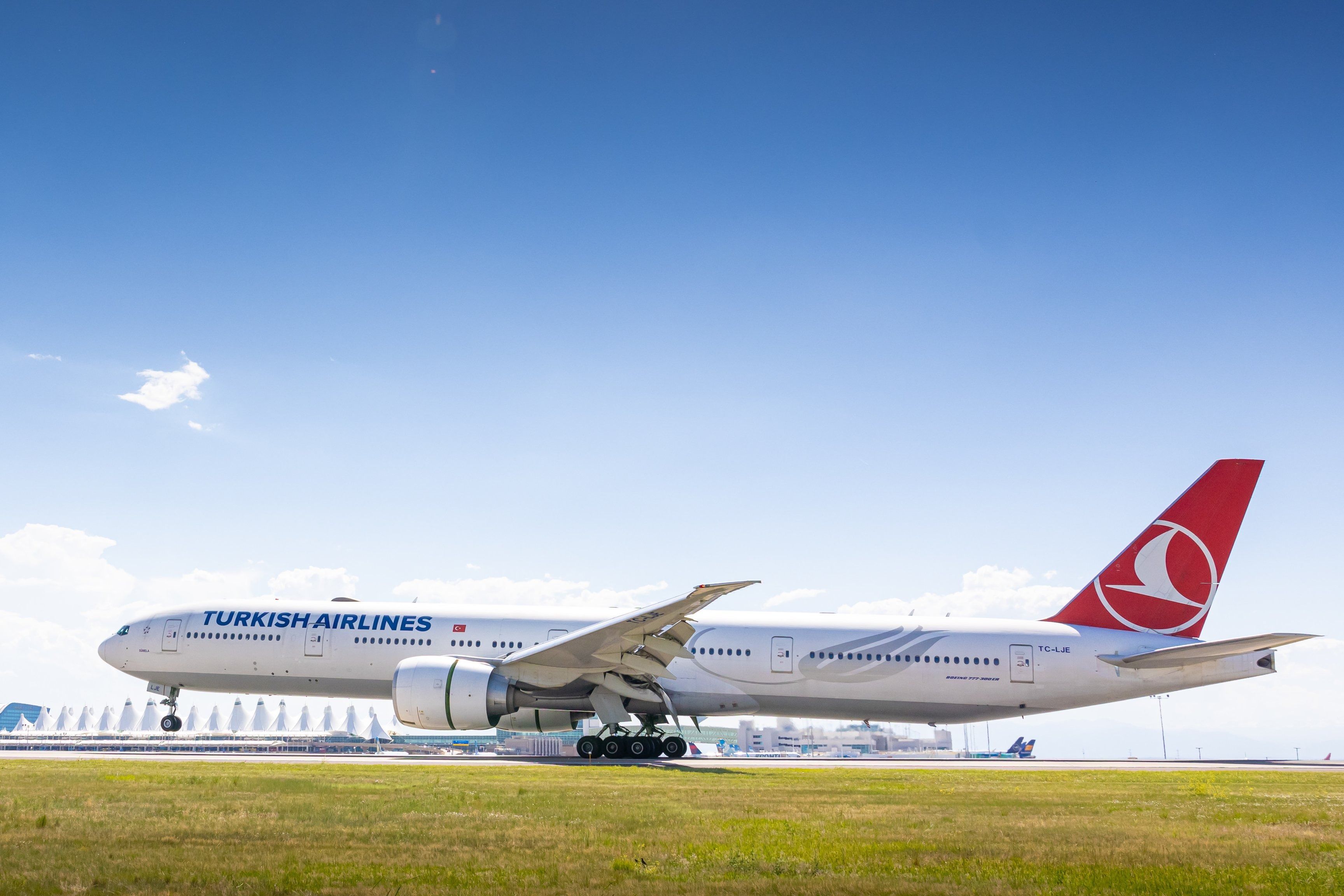 Turkish Airlines Boeing 777-300ER landing at Denver International Airport.