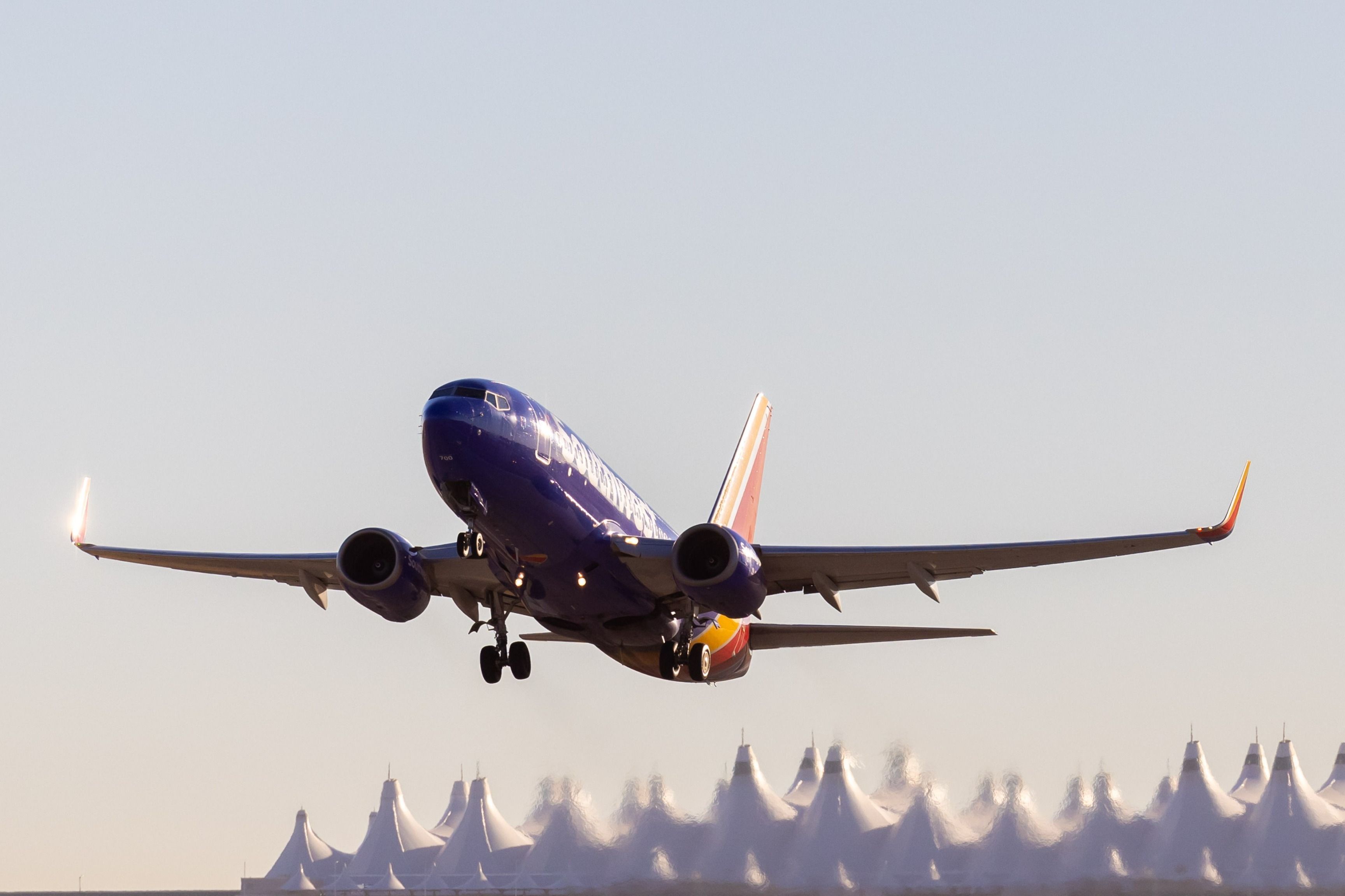 Southwest Airlines Boeing 737-700 departing from Denver International Airport.